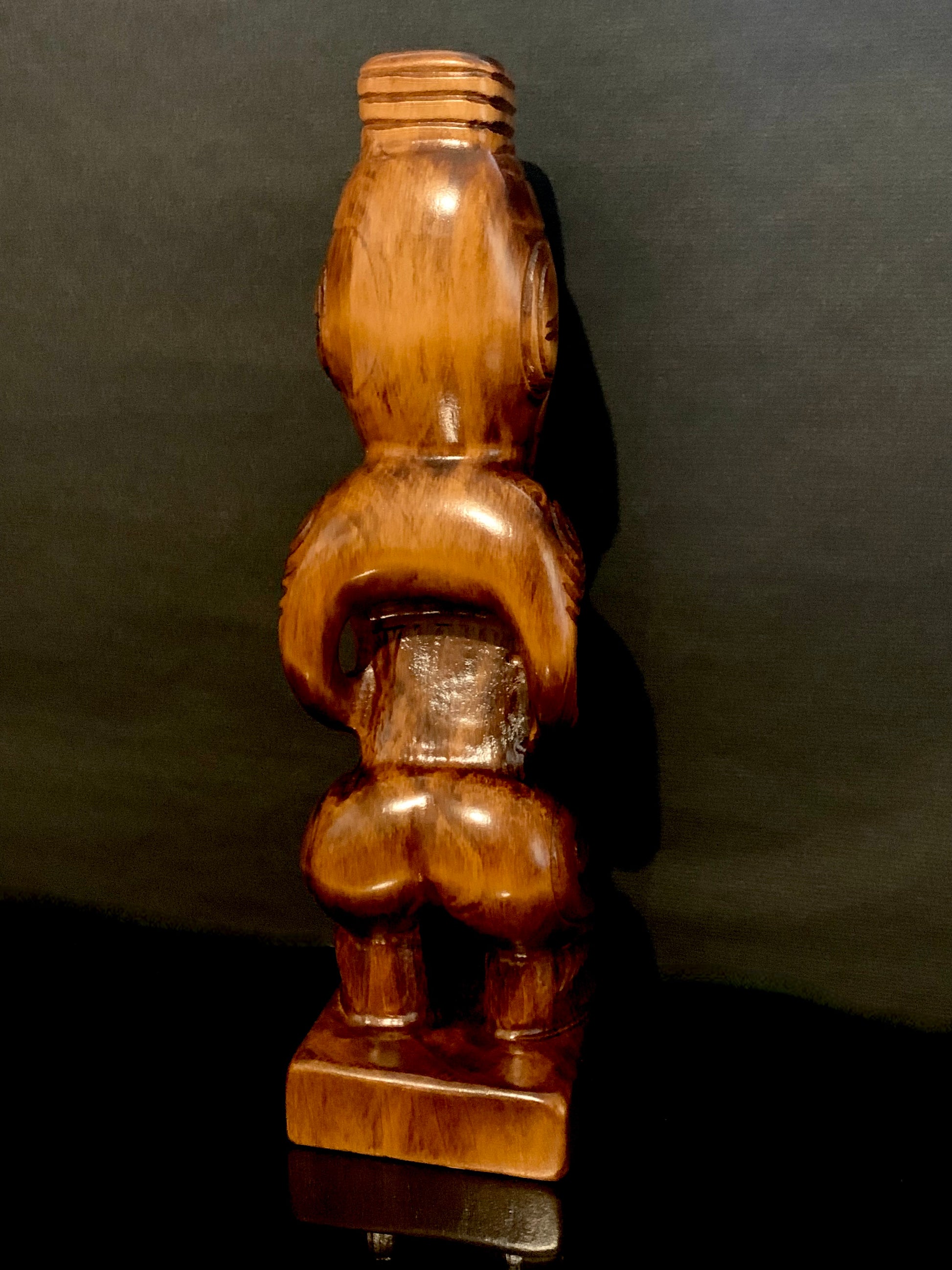 back view of Maori teko teko statue carved in New Zealand and available from Silver Fern Gallery