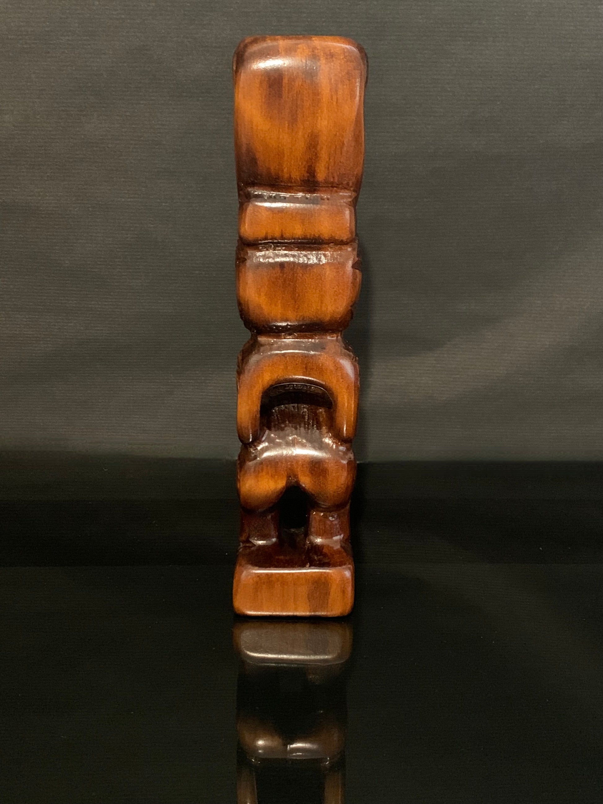 back view of small Maori teko teko carved in New Zealand by Wood Masters available from Silver Fern Gallery