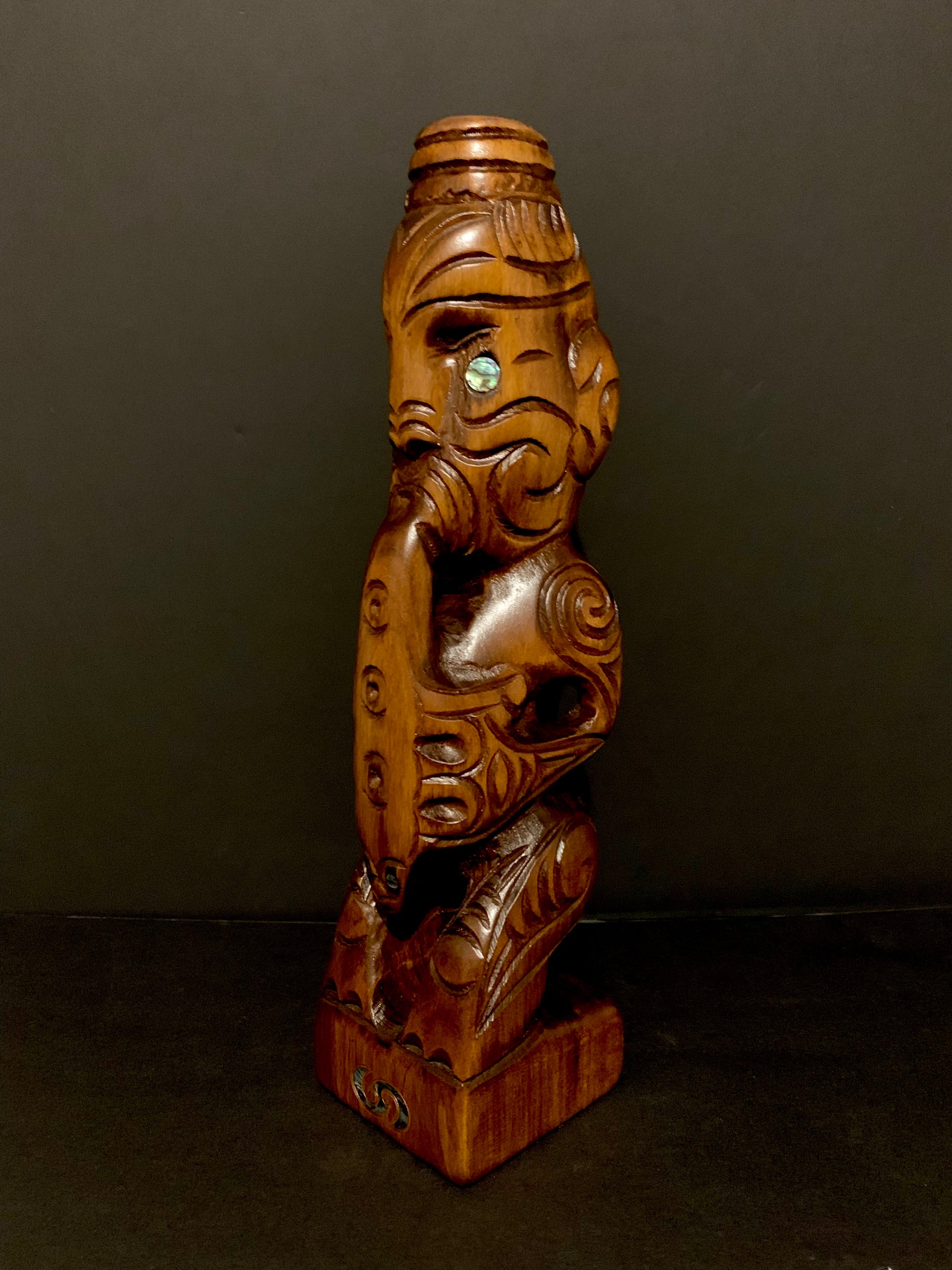 Tutanekai  carving shown looking left - New Zealand Maori teko teko carved by Wood Masters Silver Fern Gallery