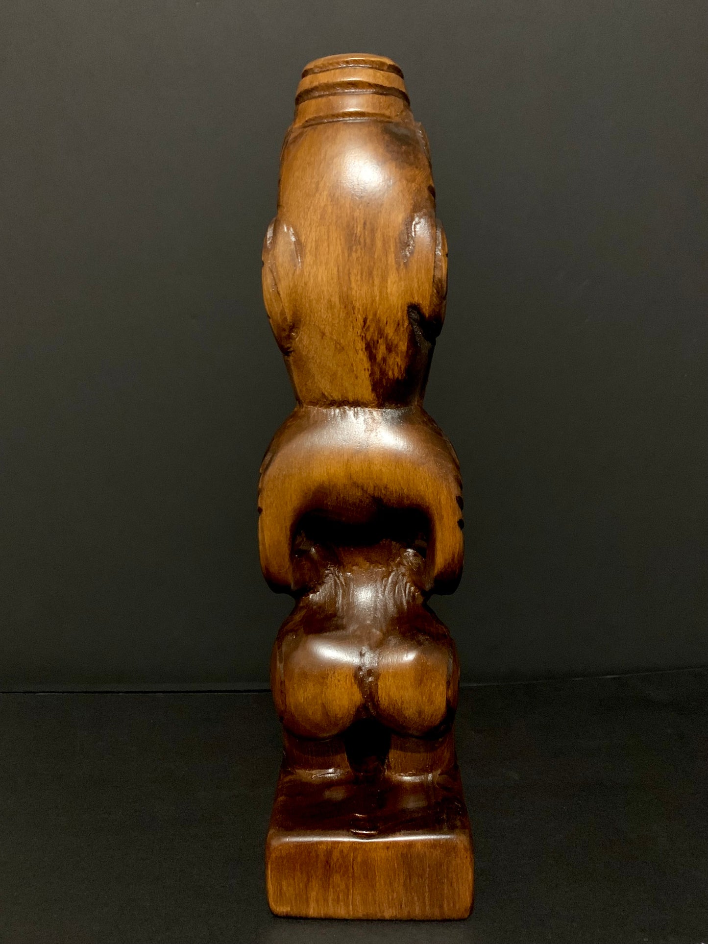 back view of New Zealand Maori teko teko carved by Wood Masters Silver Fern Gallery