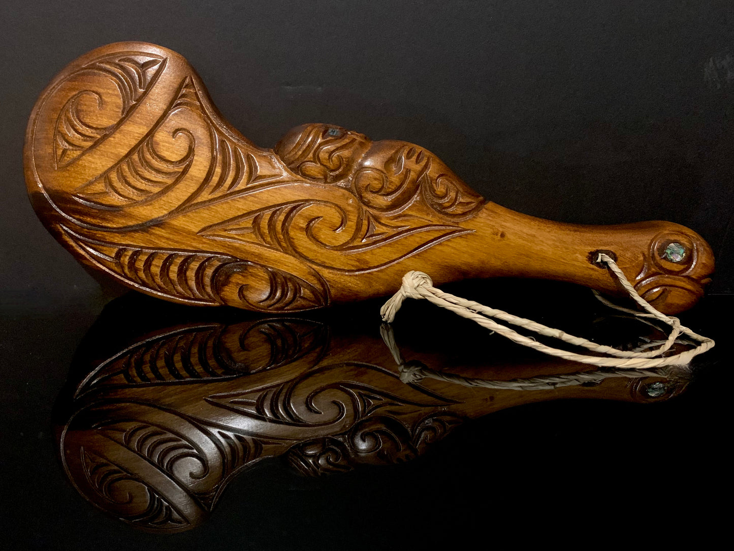 reverse view of Maori wood wahaika weapon carved in New Zealand and available from Silver Fern Gallery
