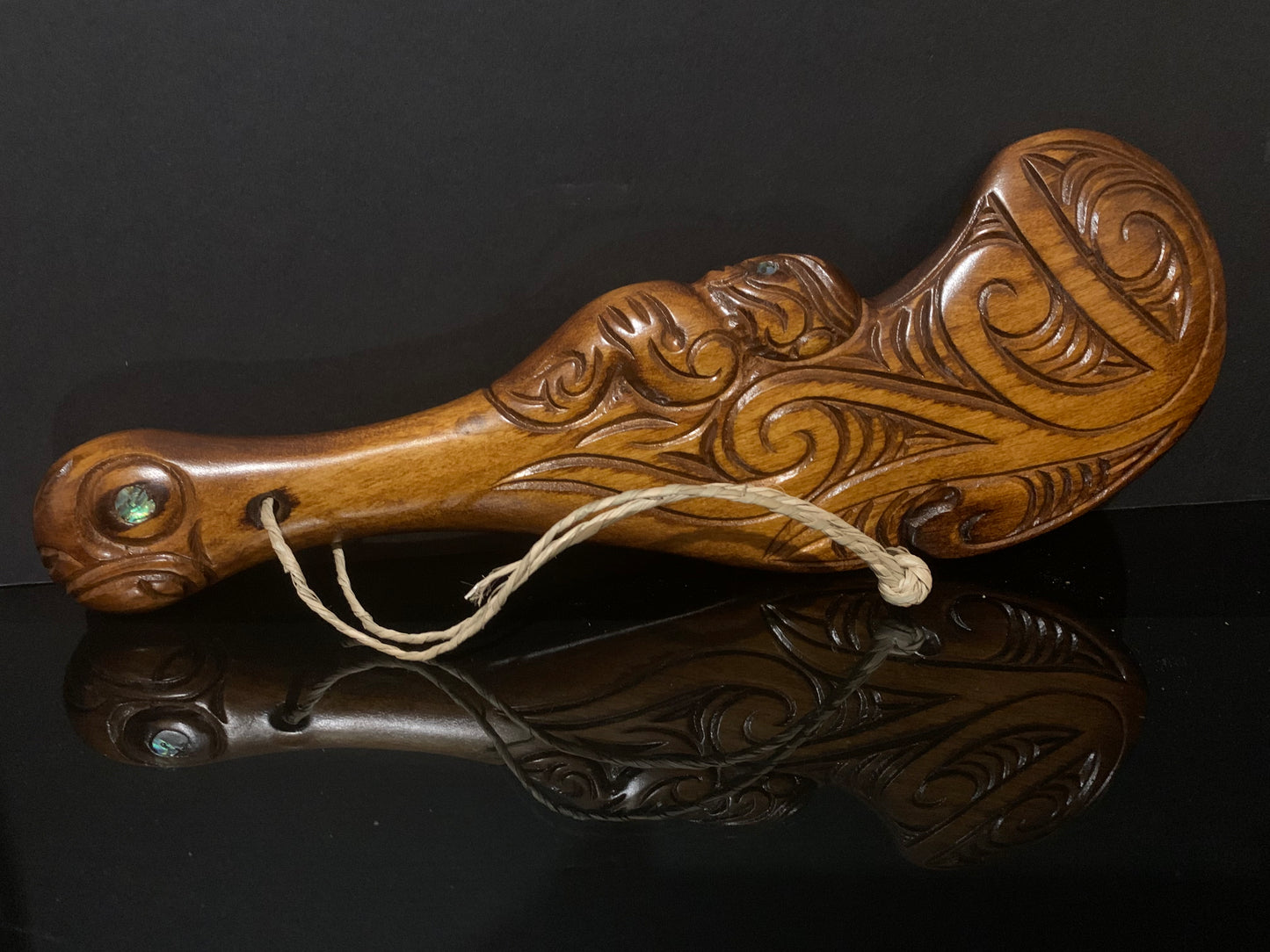 Maori wood wahaika weapon club carved in New Zealand and available from Silver Fern Gallery