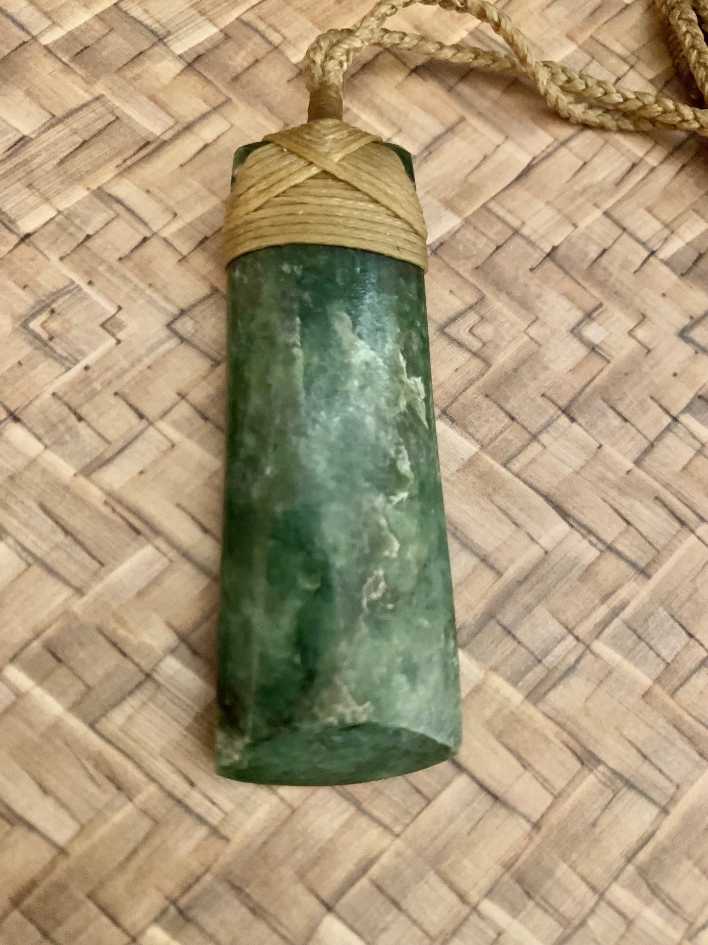 Maori Pounamu hei toki pendant from New Zealand available at Silver Fern Gallery