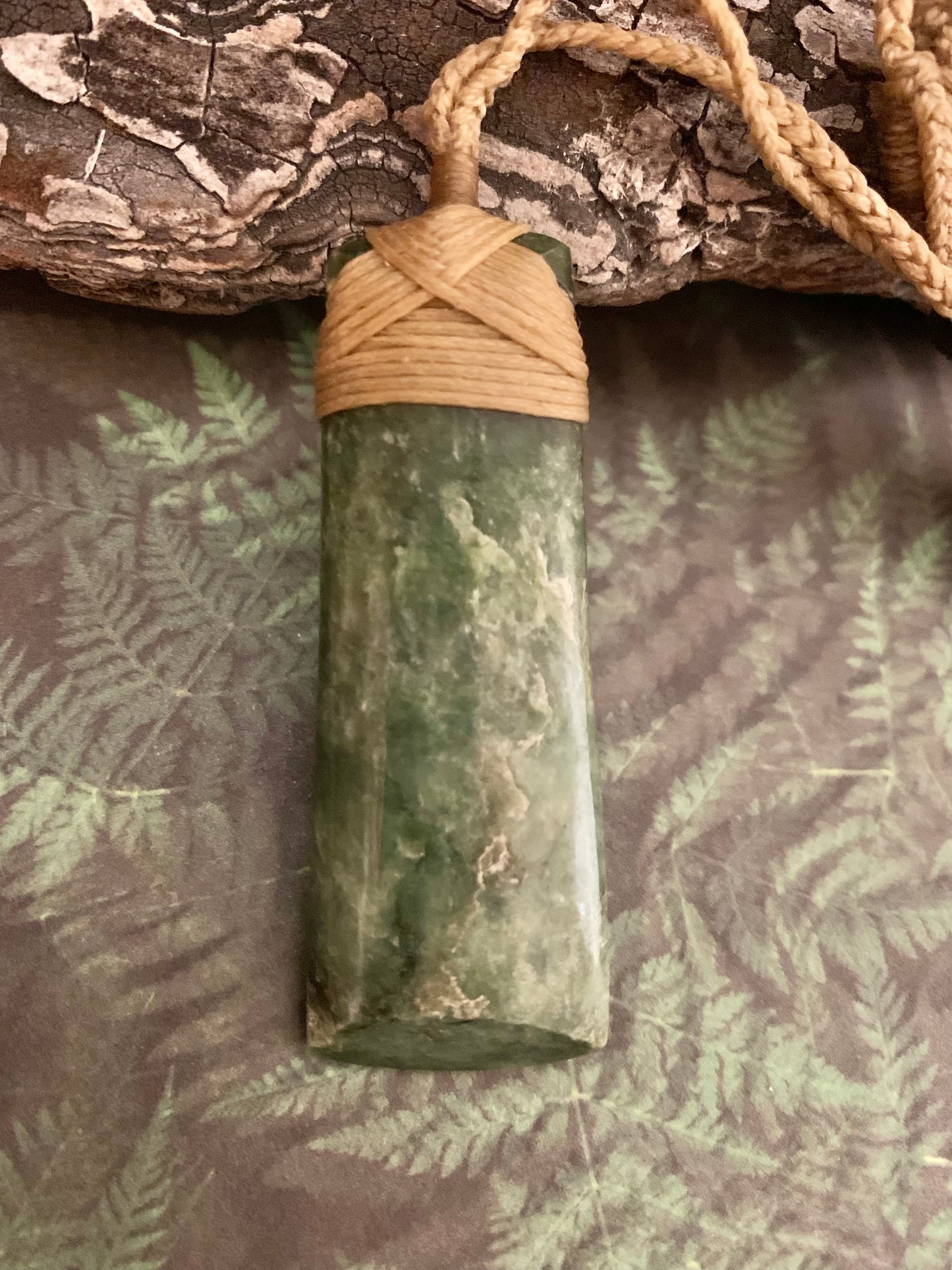 Maori Pounamu hei toki pendant from New Zealand available at Silver Fern Gallery