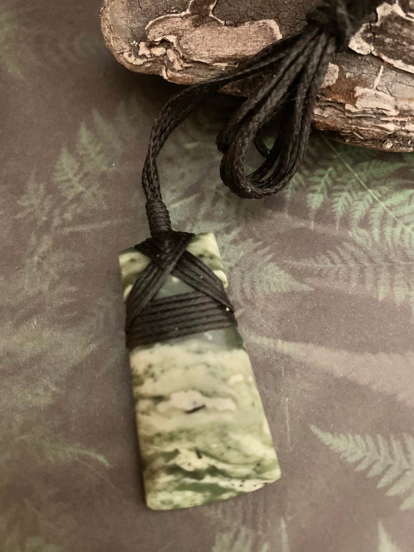 Maori Pounamu hei toki pendant from New Zealand available at Silver Fern Gallery