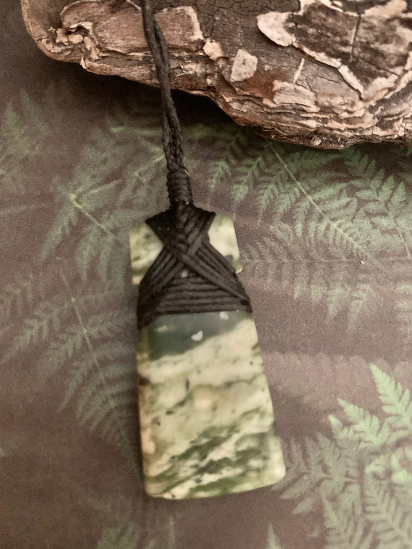 Maori Pounamu hei toki pendant from New Zealand available at Silver Fern Gallery