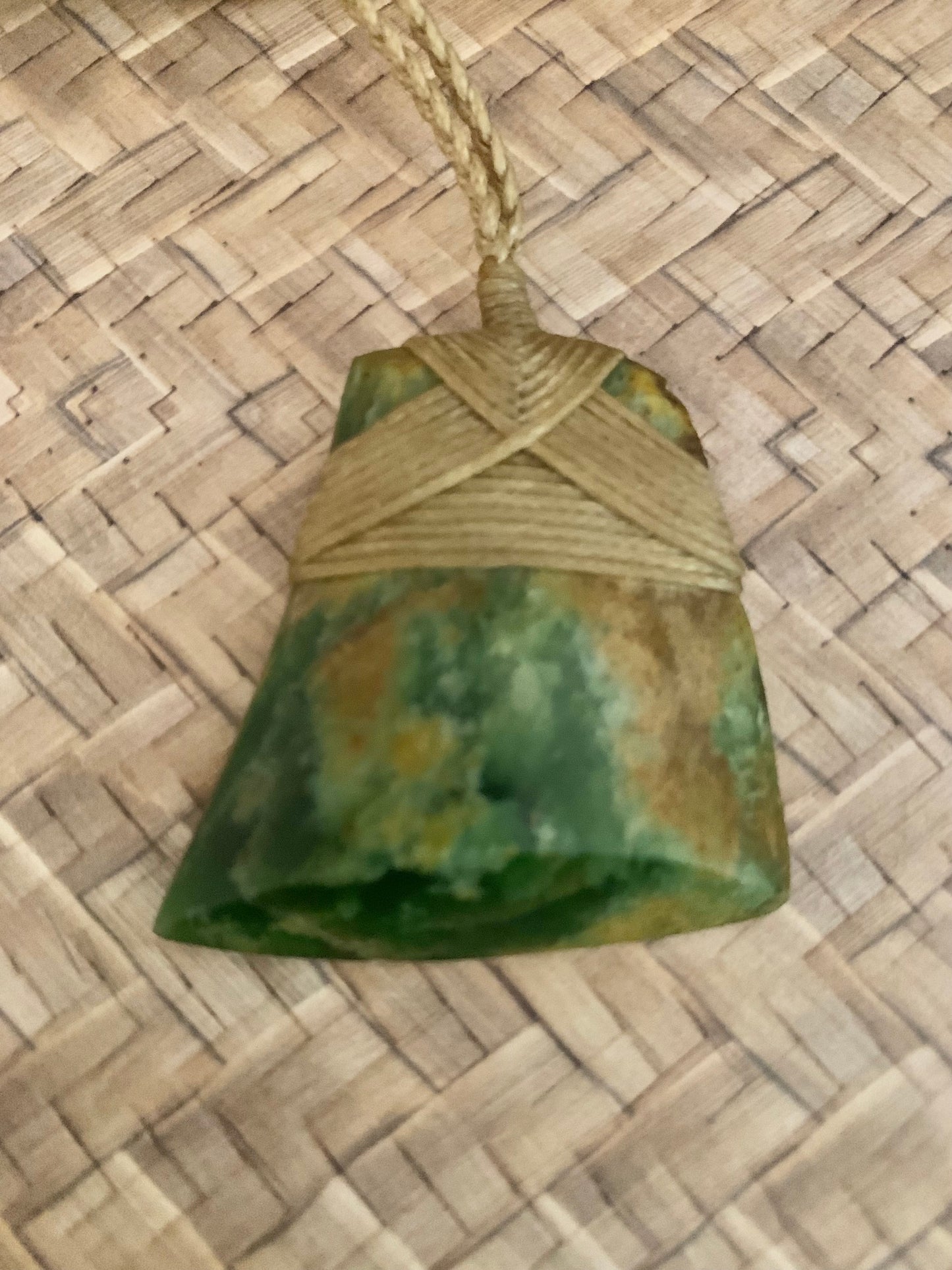 Maori Flower Jade Pounamu hei toki pendant from New Zealand available to purchase