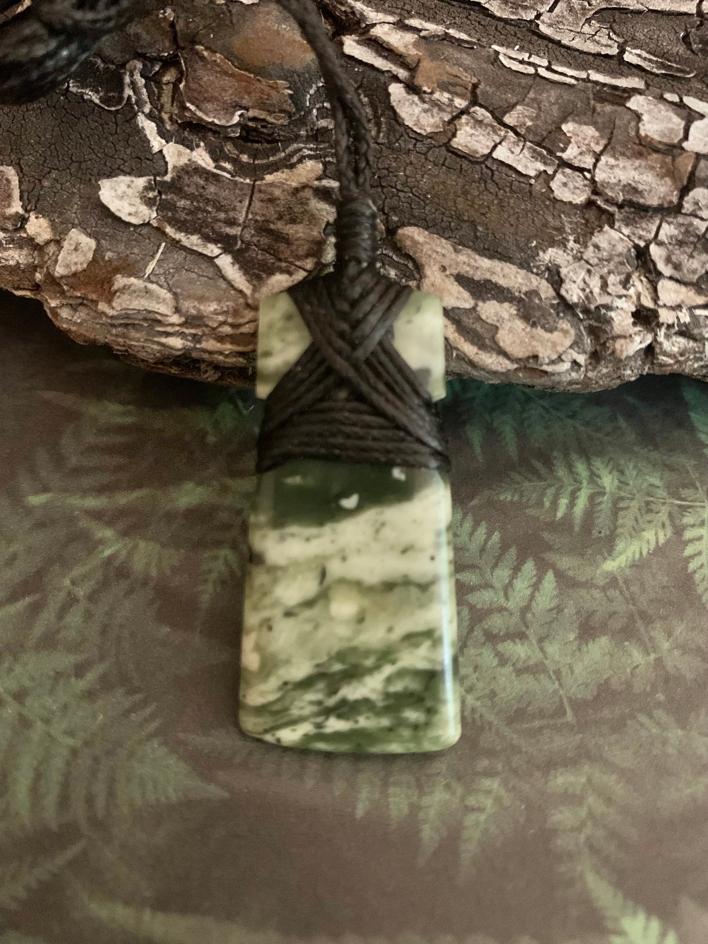 Maori Pounamu hei toki pendant from New Zealand available at Silver Fern Gallery