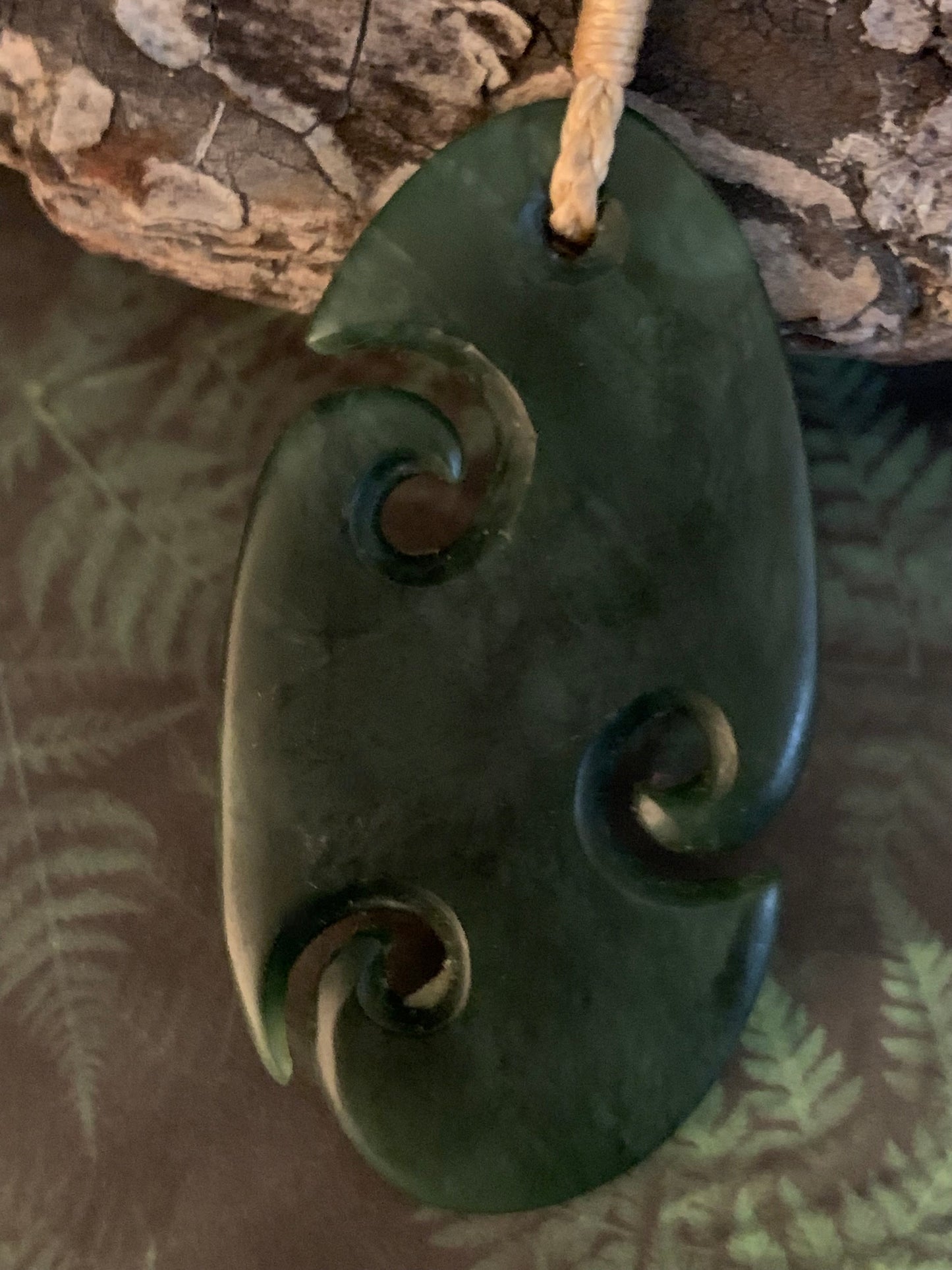 reverse of Pounamu koru pendant from New Zealand available from Silver Fern Gallery