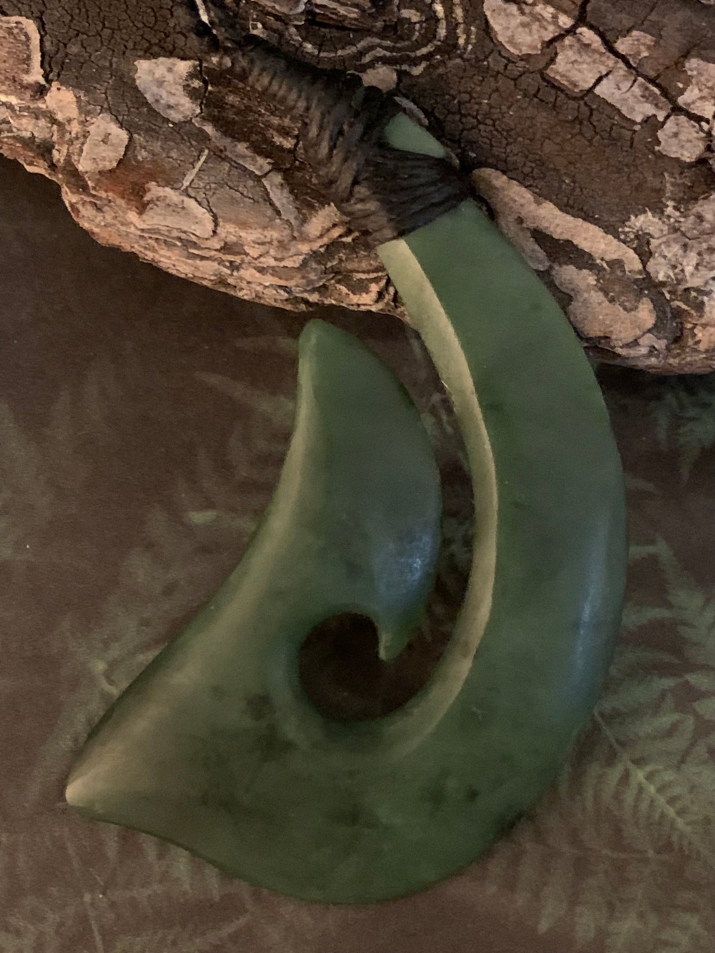 Maori made hei matau fish hook from New Zealand Pounamu greenstone jade