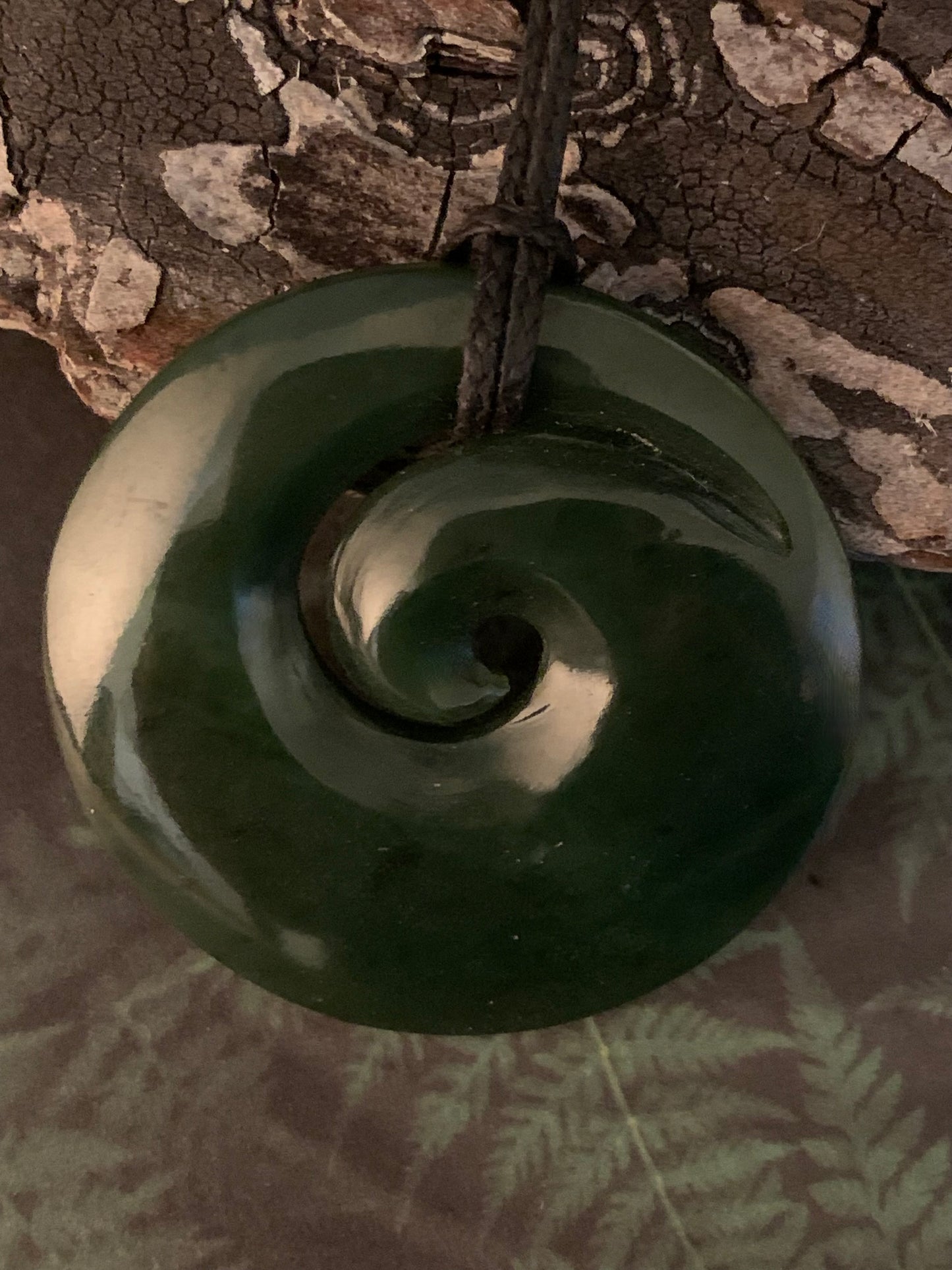 New Zealand Maori koru spiral pounamu adornment available from Silver Fern gallery