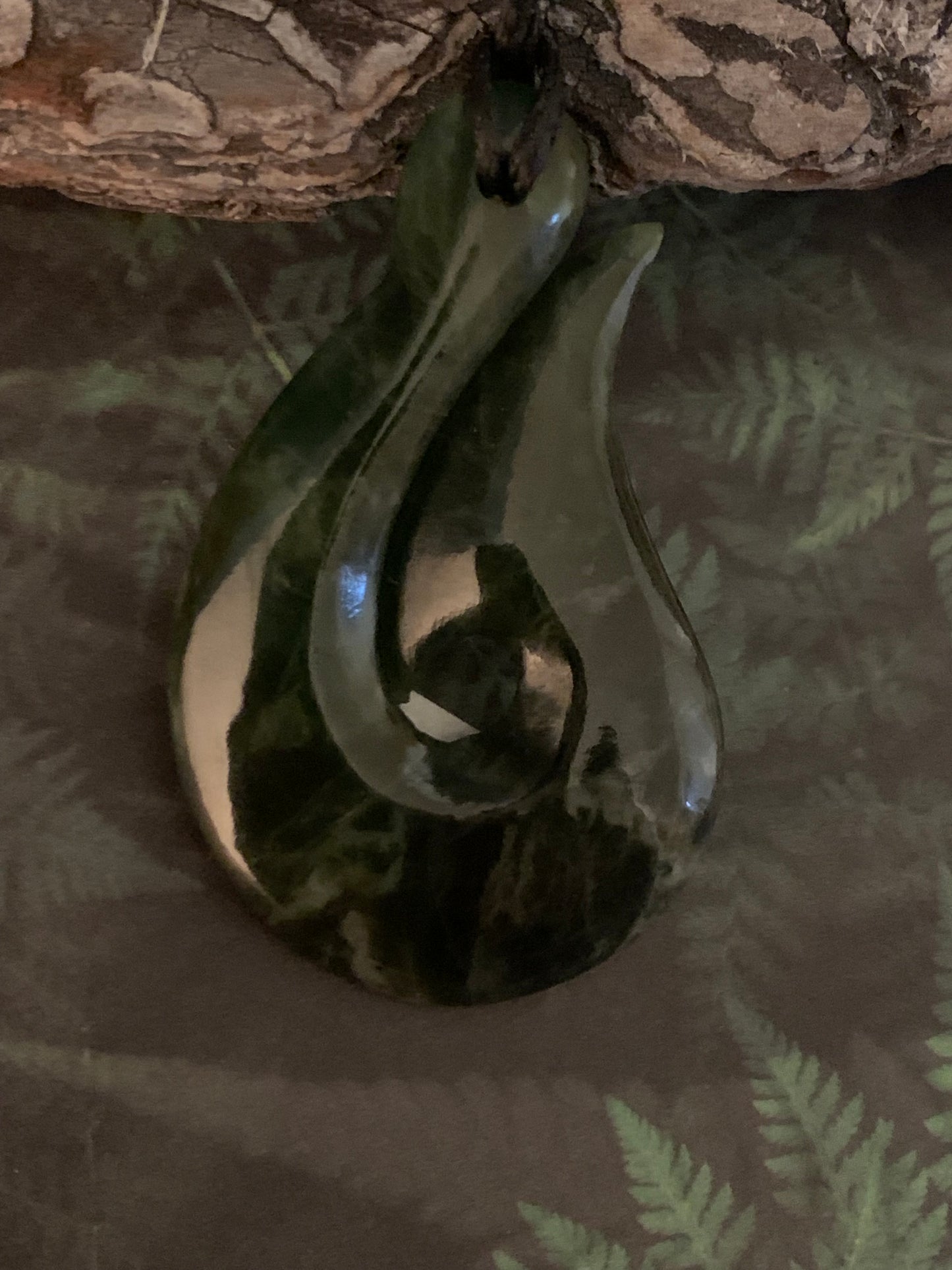 New Zealand Maori hei matau greenstone adornment available from Silver Fern gallery