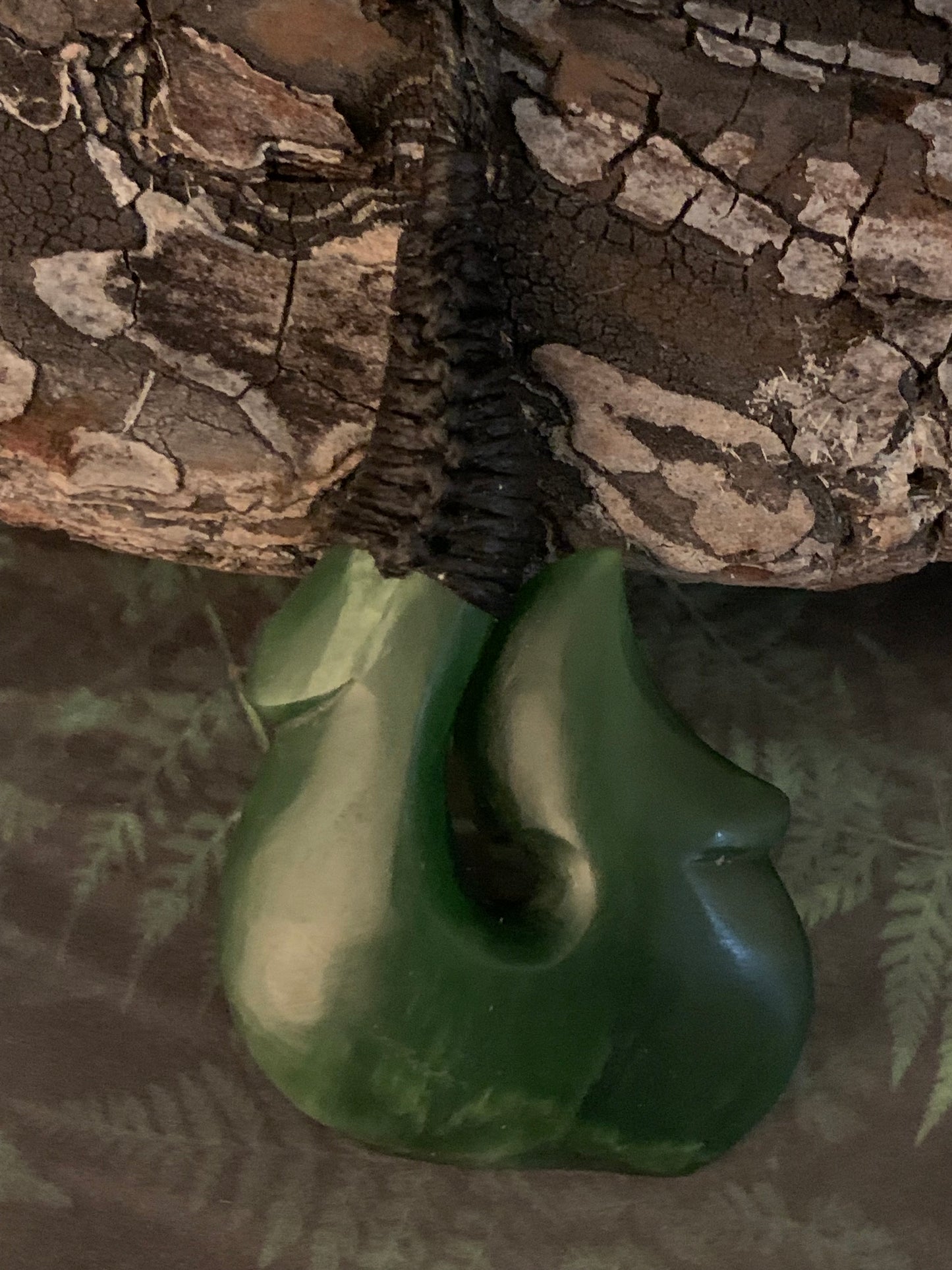 Maori made hei matau fish hook from New Zealand Pounamu greenstone jade