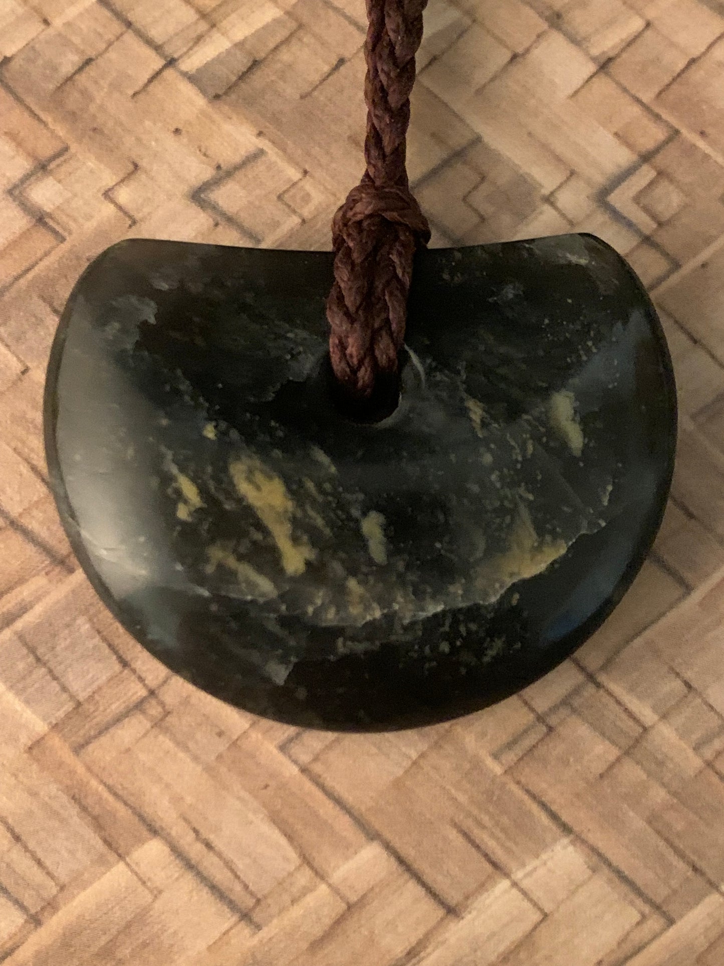 New Zealand Maori freeform pounamu adornment available from Silver Fern gallery