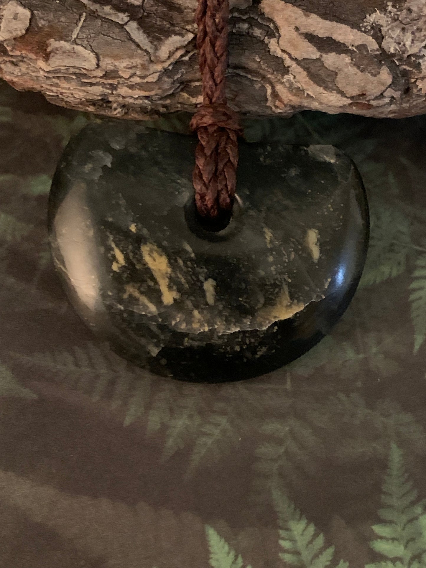 front view of New Zealand Maori freeform pounamu adornment available from Silver Fern gallery
