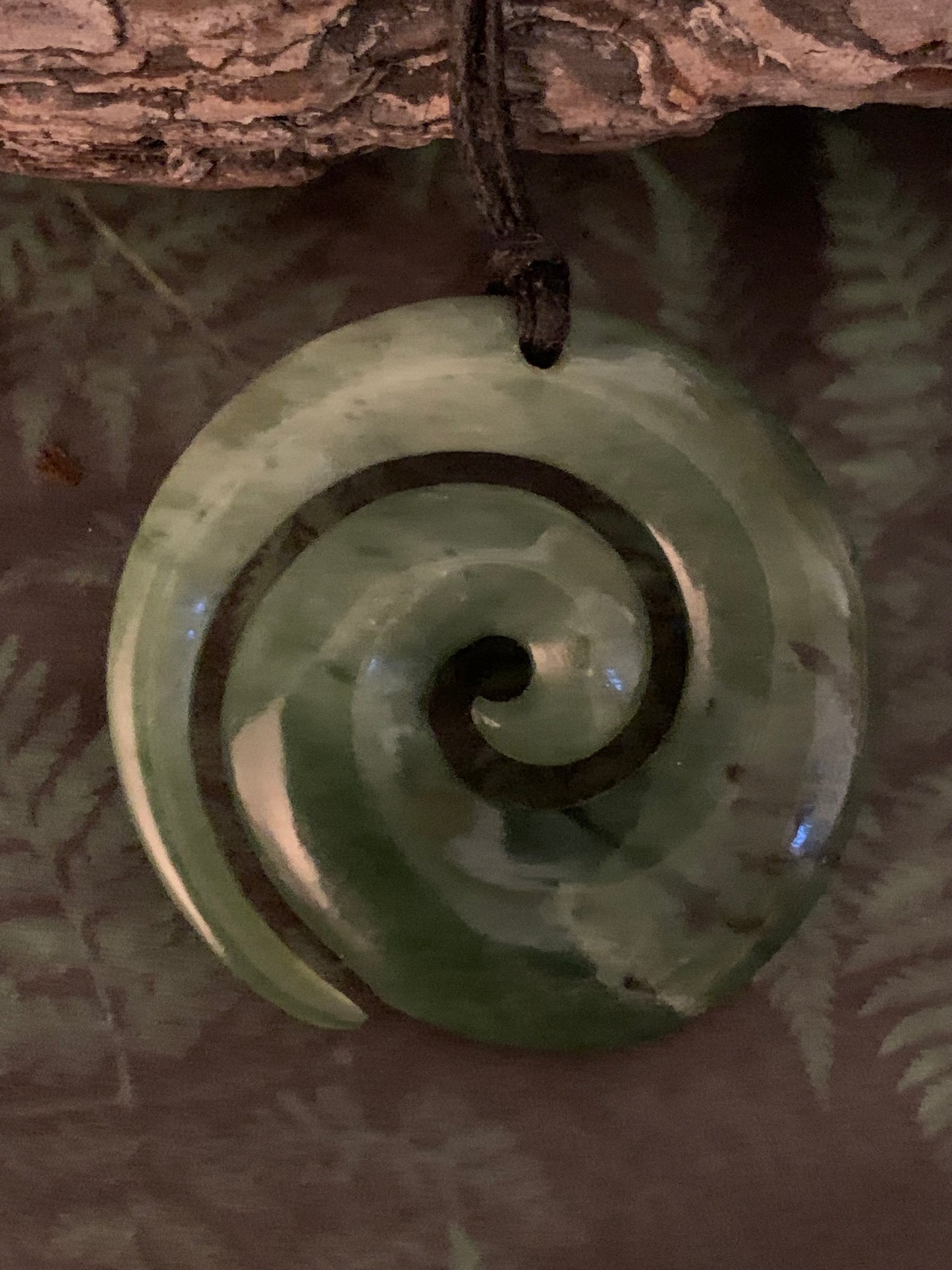 Pounamu koru pendant from New Zealand available from Silver Fern Gallery