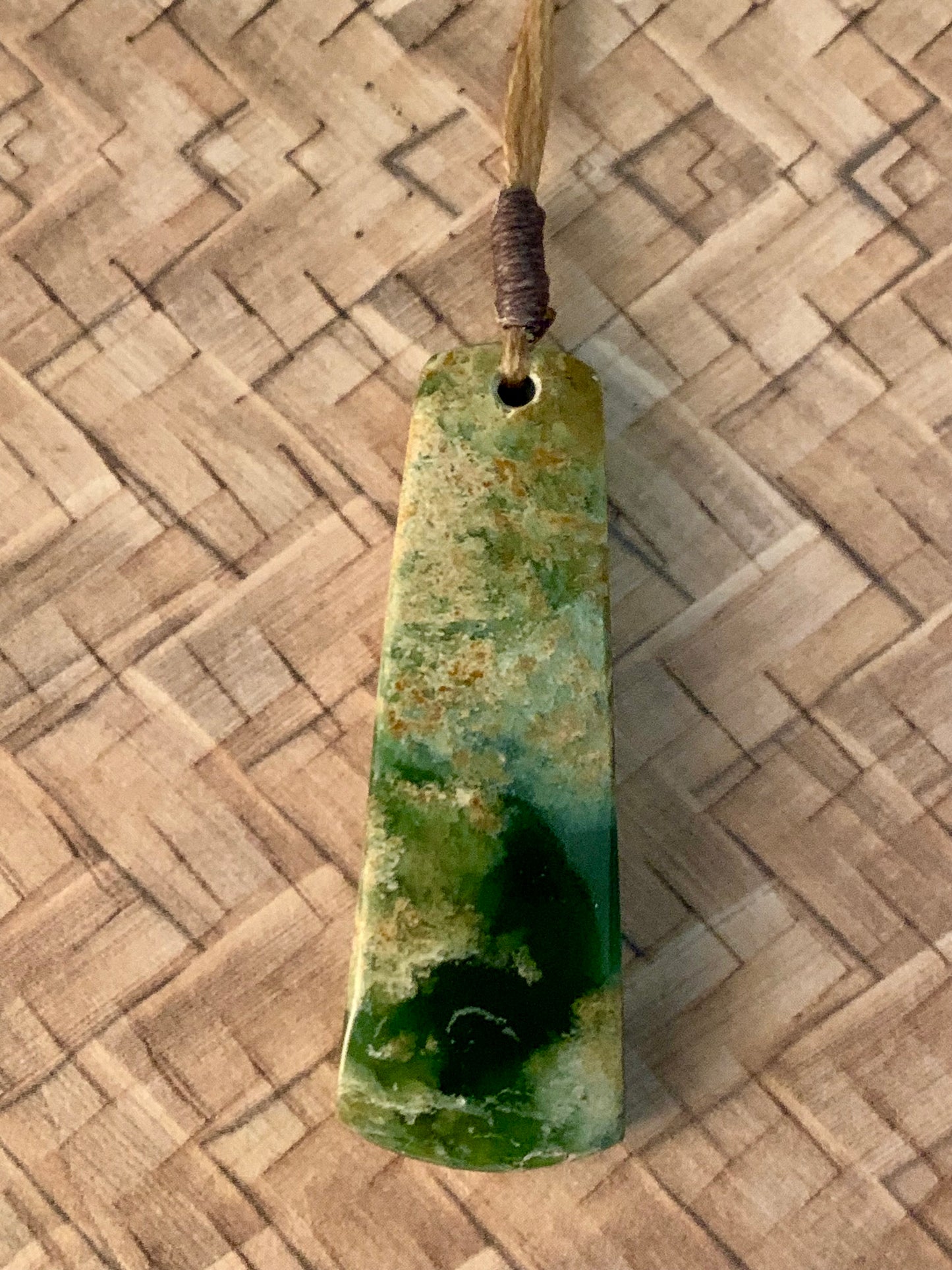 New Zealand Maori toki pounamu adornment available from Silver Fern Gallery