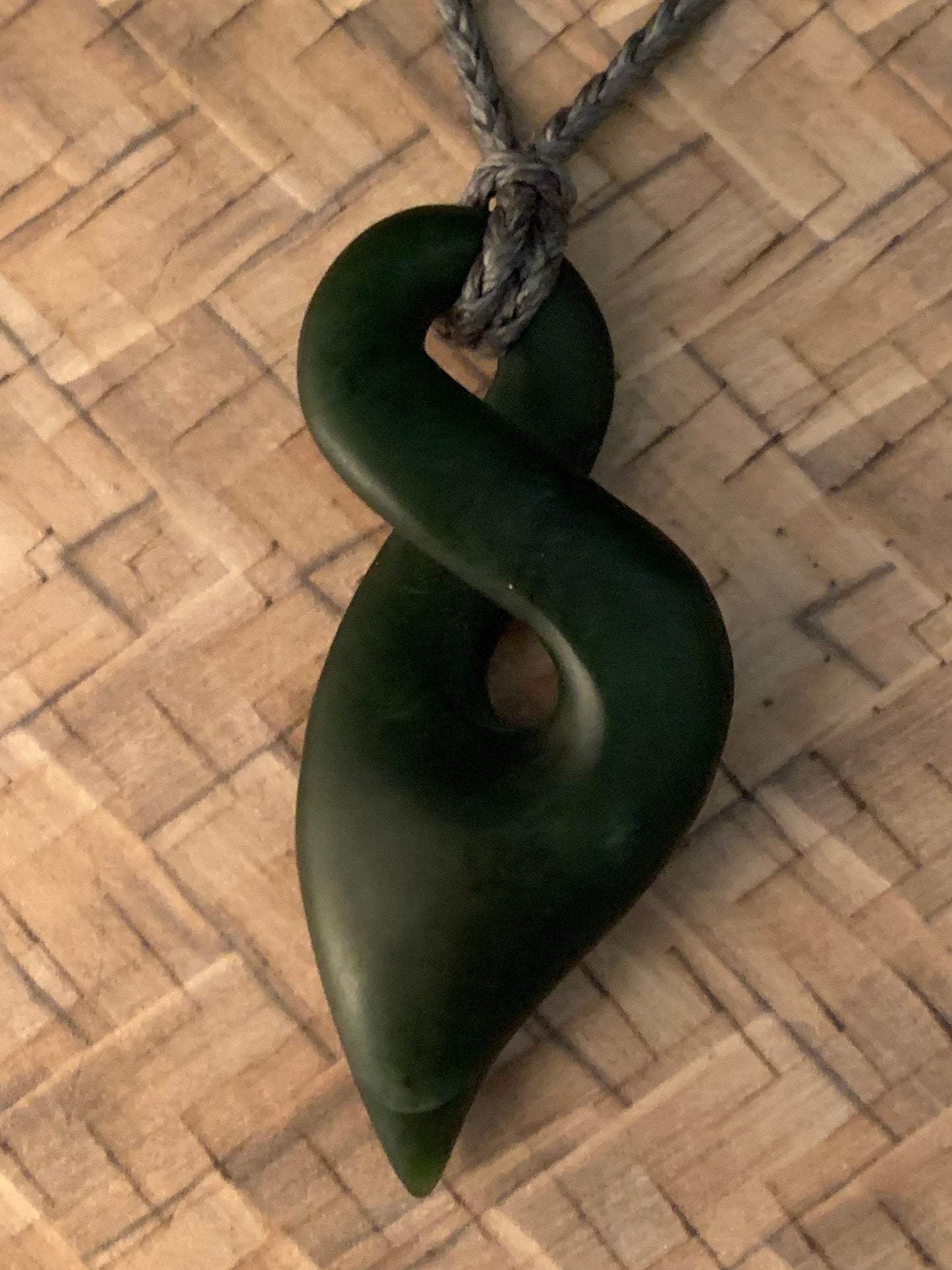 single twist pikorua pendant from New Zealand carved from NZ Pounamu
