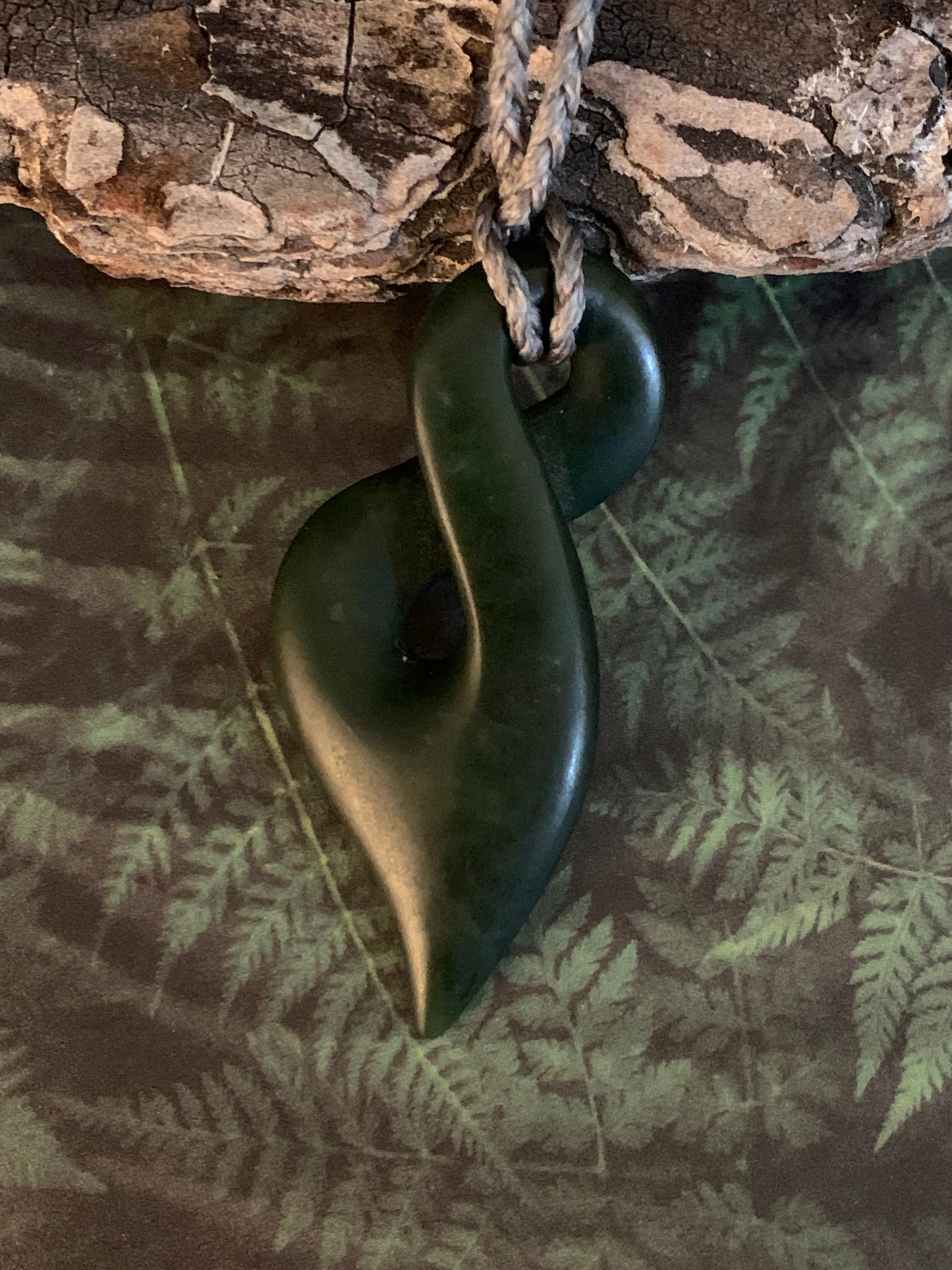 single twist pikorua pendant from New Zealand carved from NZ Pounamu greenstone