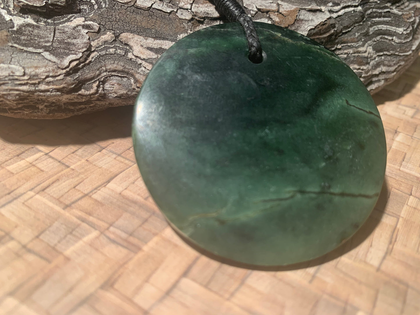 Pounamu Koru Porohita disc made by Alex Sands 50mm