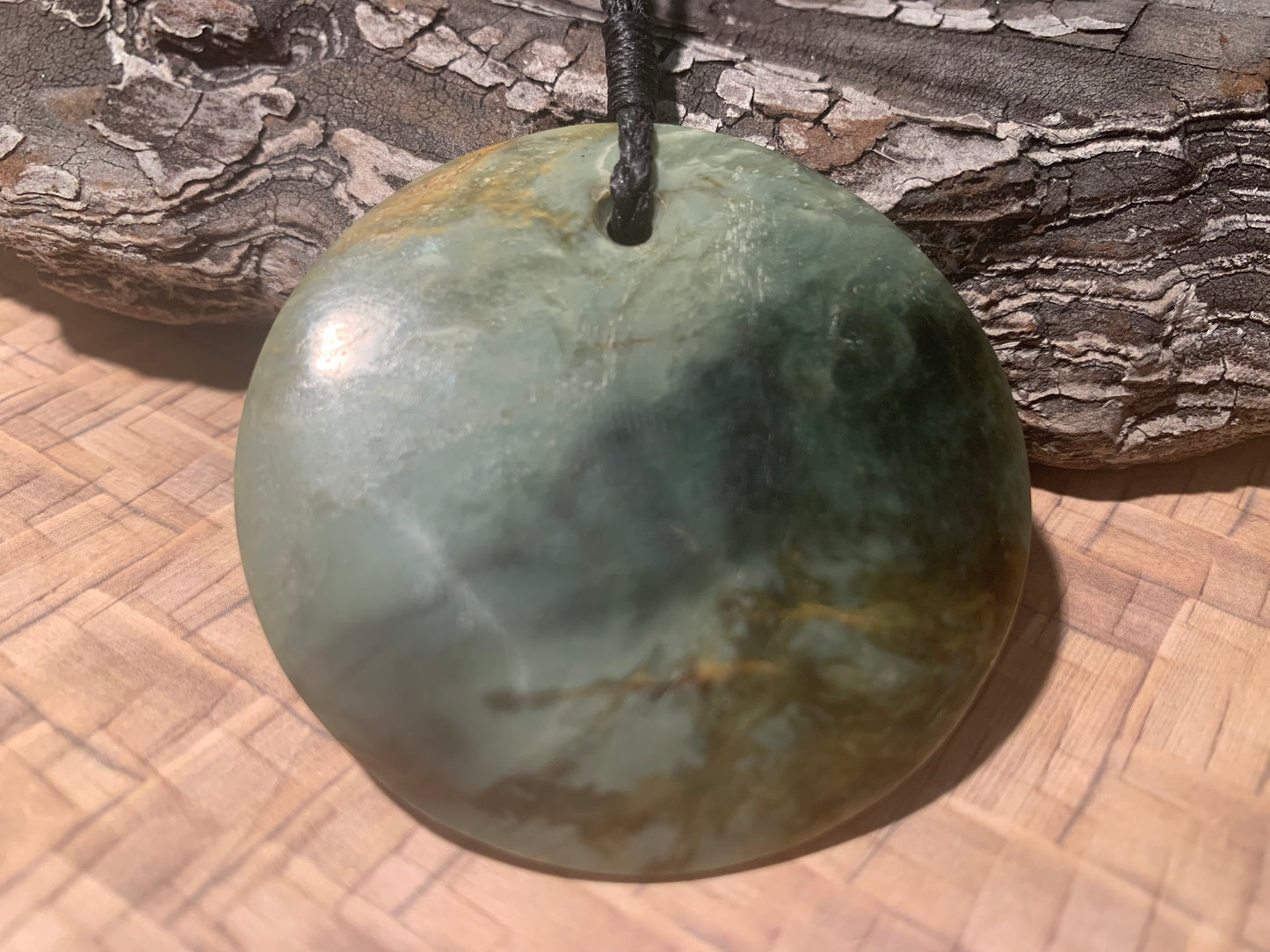 Pounamu Koru Porohita disc carved by Alex Sands 50mm