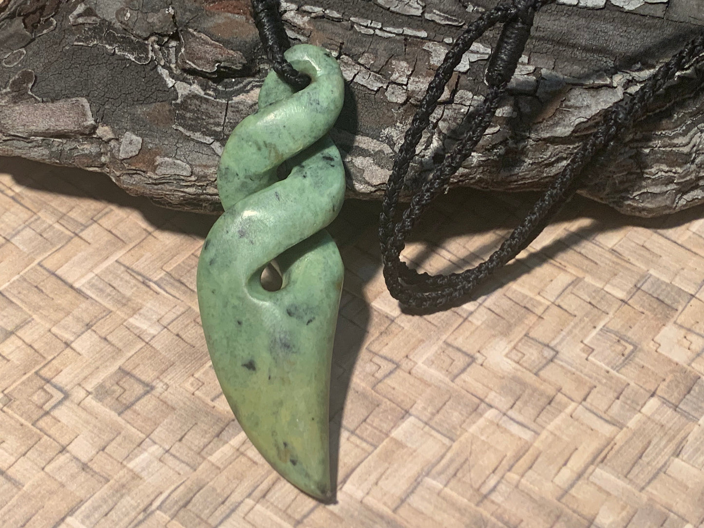 back view of Pounamu Koru Porohita disc made by Alex Sands 70mm