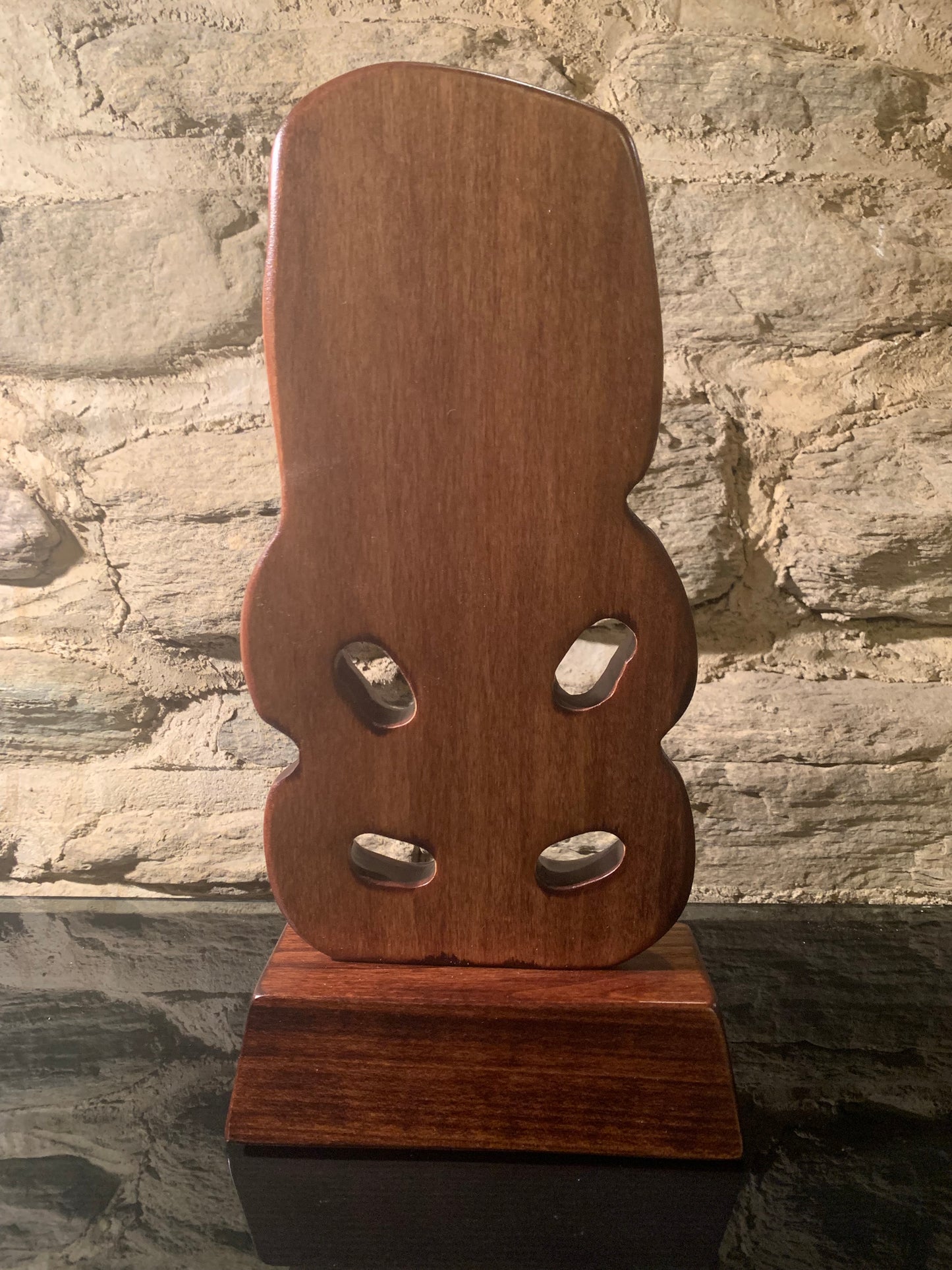 back view of small Maori tiki carved in New Zealand and available from Silver Fern Gallery