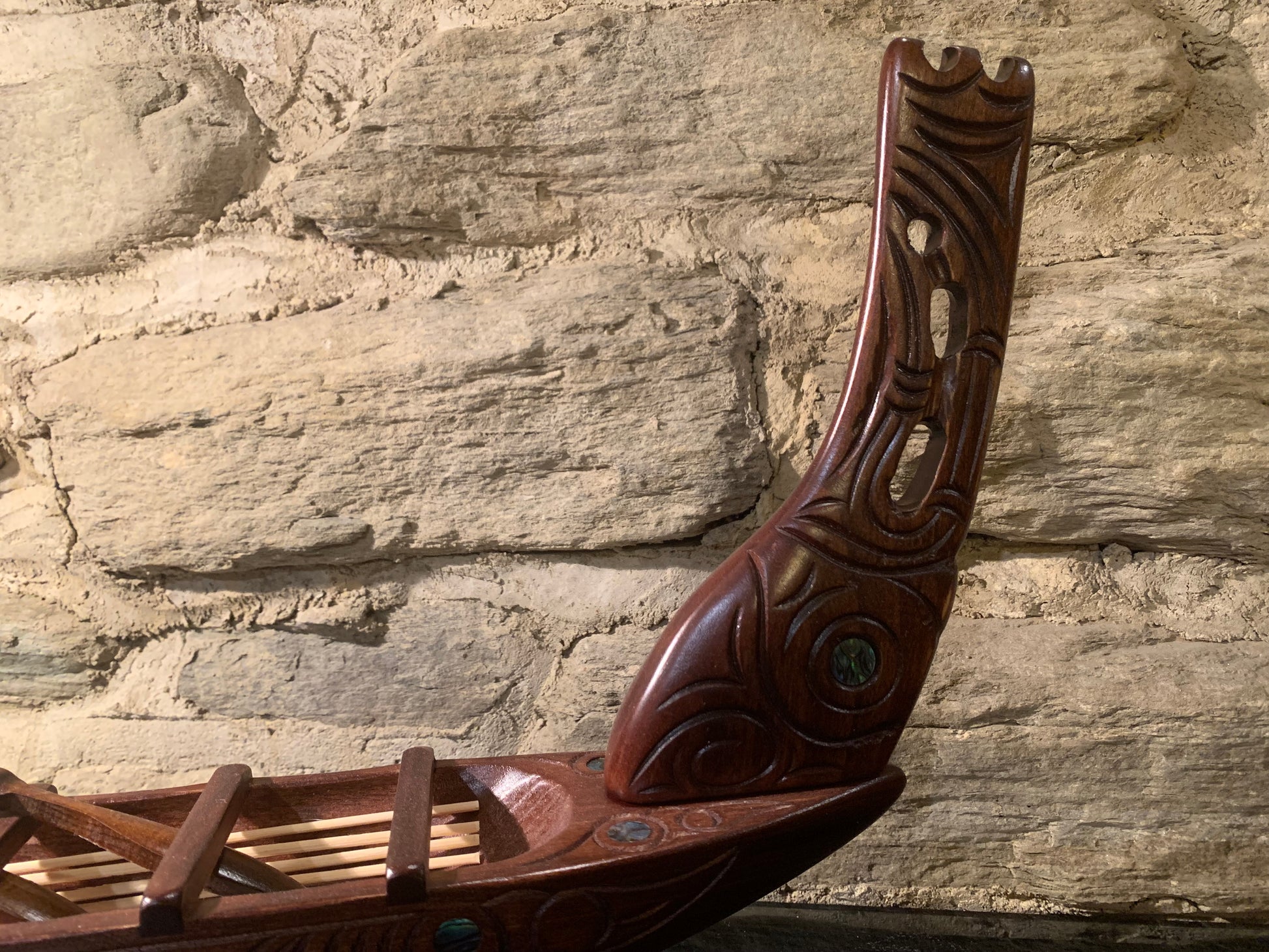stern view of Maori small waka canoe carved in New Zealand and available from Silver Fern Gallery
