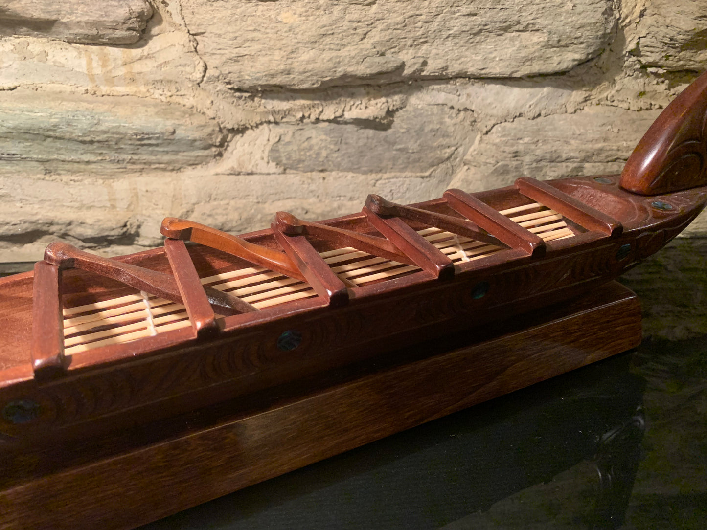 paddles and seats of Maori small waka canoe carved in New Zealand and available from Silver Fern Gallery