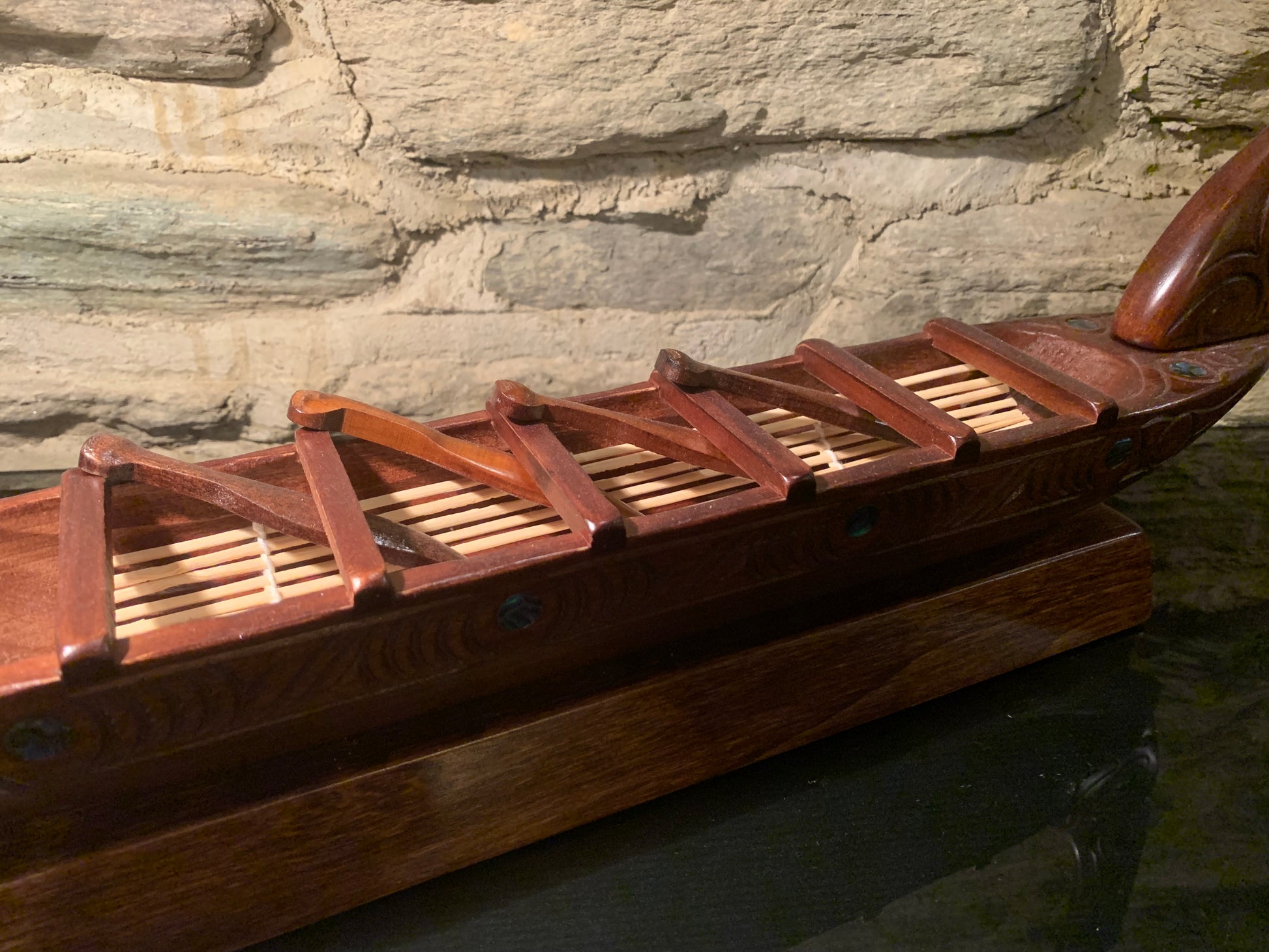 paddles and seats of Maori small waka canoe carved in New Zealand and available from Silver Fern Gallery
