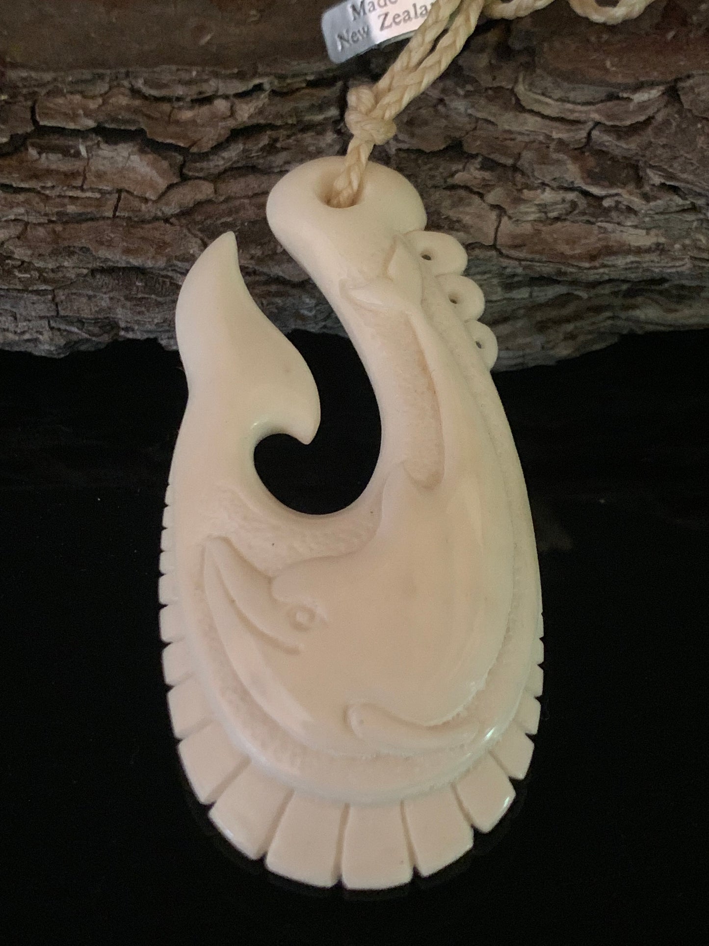 Bone Dolphin Hei Matau Pendant - by Norman Clark