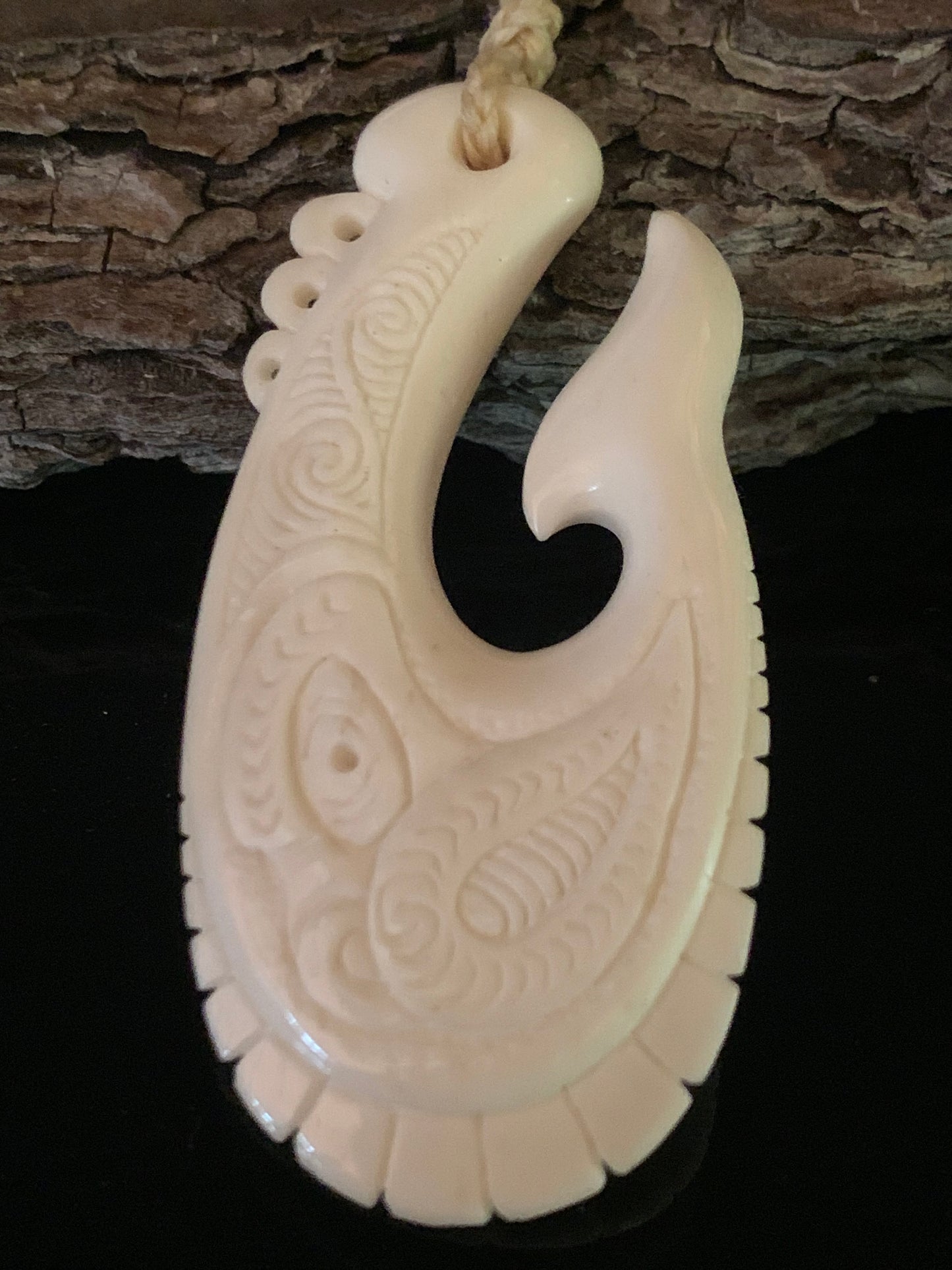 Bone Dolphin Hei Matau Pendant - by Norman Clark