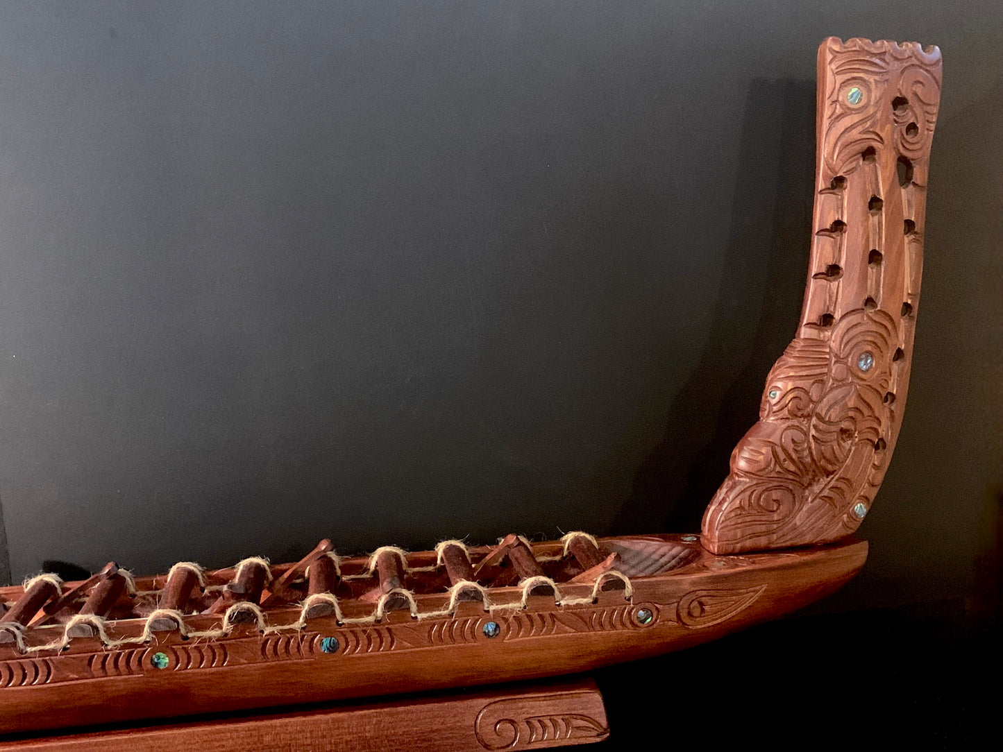 Carved Waka Taua on stand - by Wood Masters
