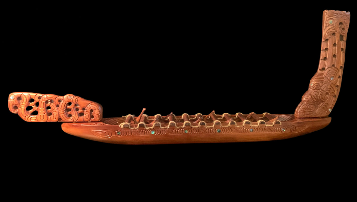 Carved Waka Taua on stand - by Wood Masters