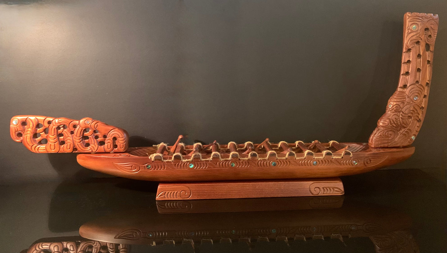 Carved Waka Taua on stand - by Wood Masters