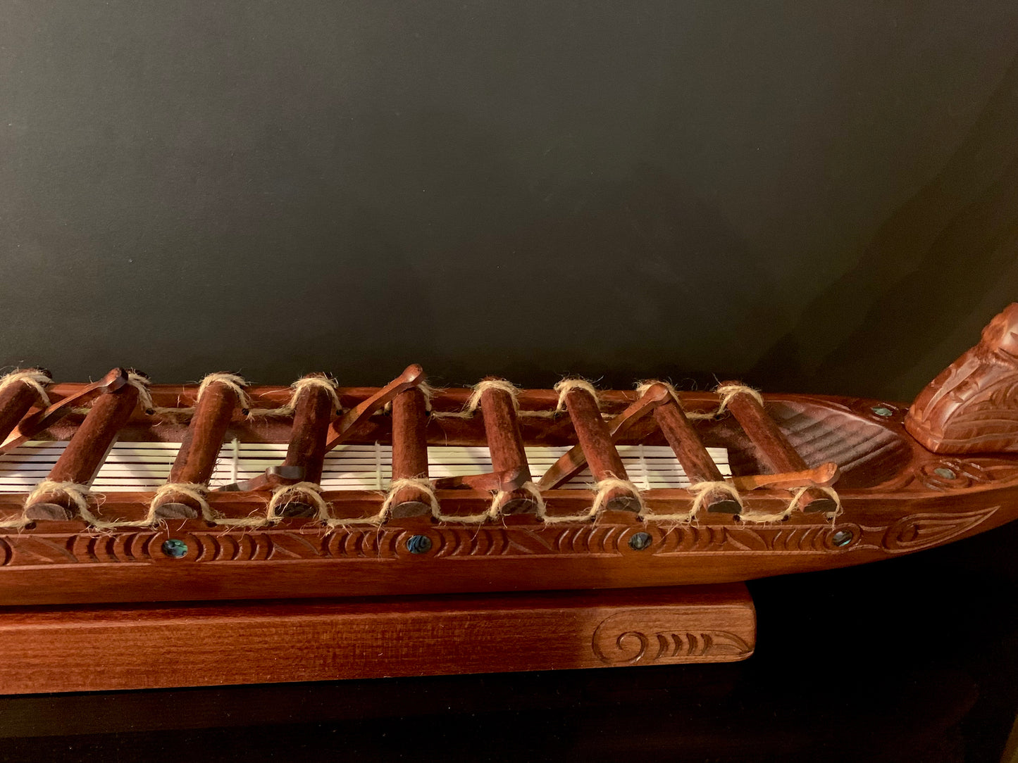 Carved Waka Taua on stand - by Wood Masters