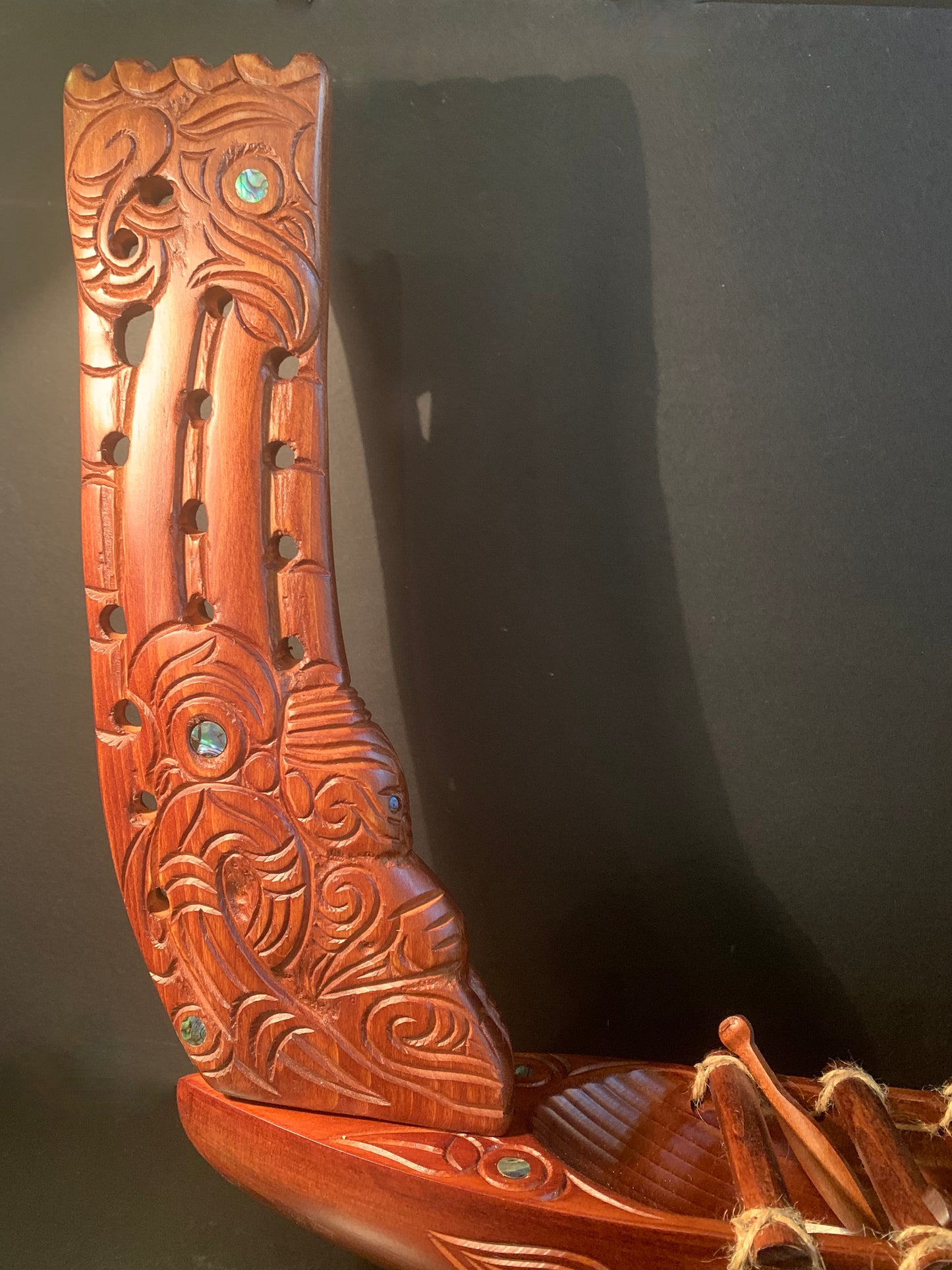 Carved Waka Taua on stand - by Wood Masters