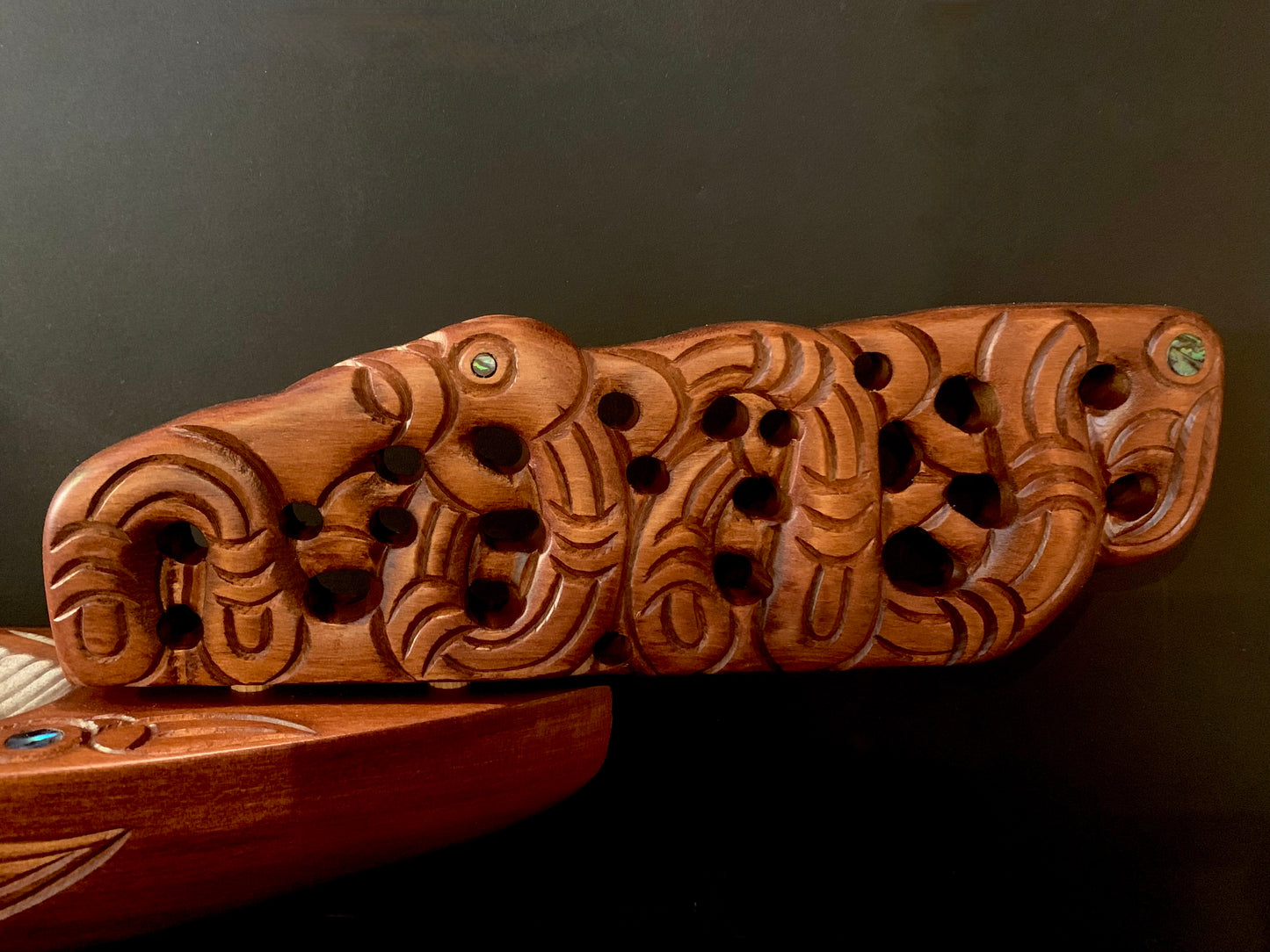 Carved Waka Taua on stand - by Wood Masters