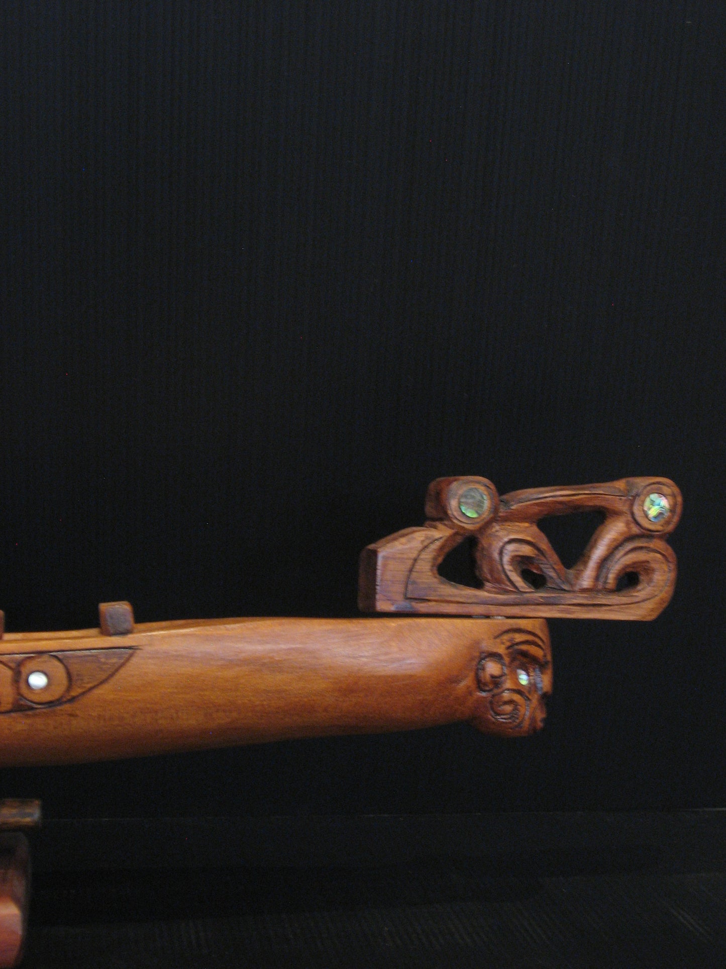 Bow view New Zealand Maori Waka Taua Canoe Carving by Grary Holder Silver Fern Gallery