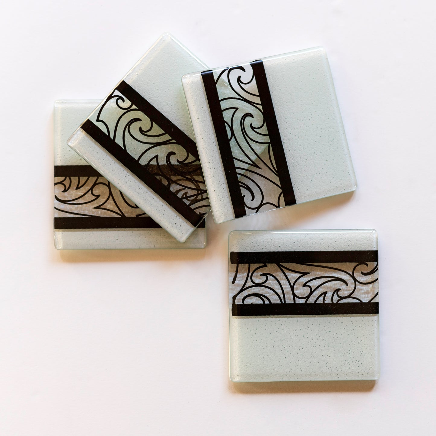 Fused Glass Coaster Set by Maori Boy Rongo Design White and Black Silver Fern Gallery