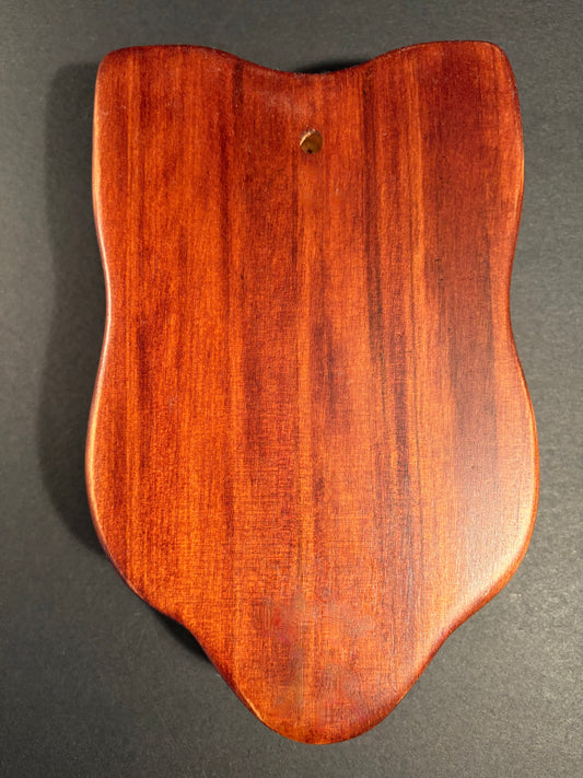 showing reverse side of maori mask