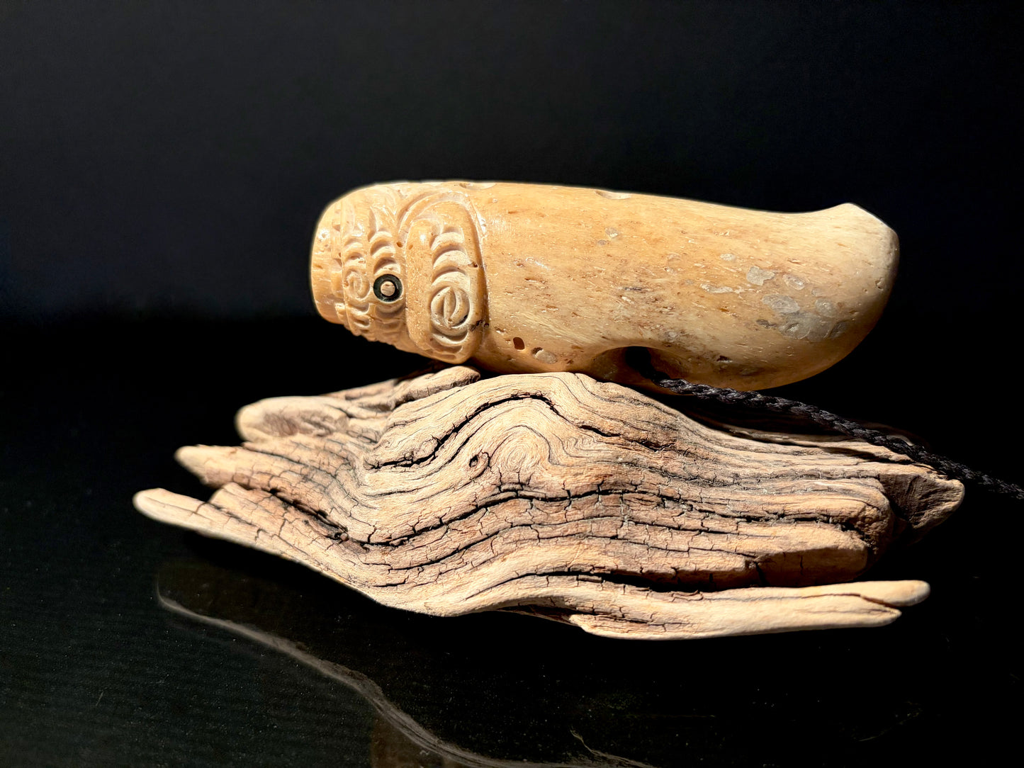 Carved Nguru (flute) Parāoa (sperm whale jawbone) by Alex Sands