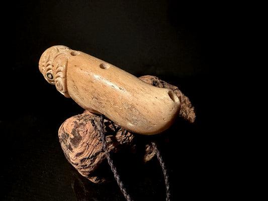 Carved Nguru (flute) Parāoa (sperm whale jawbone) by Alex Sands