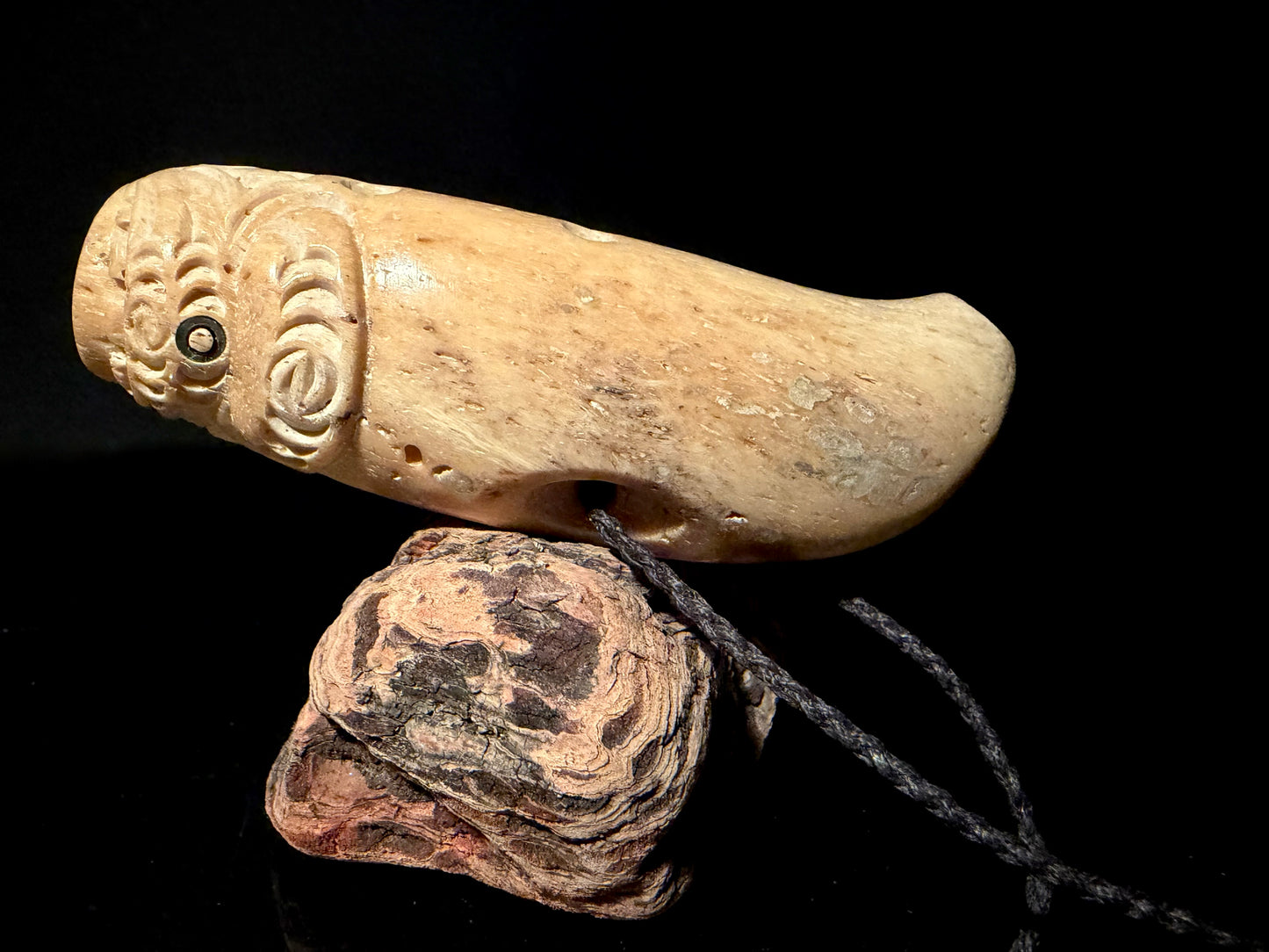 Carved Nguru (flute) Parāoa (sperm whale jawbone) by Alex Sands