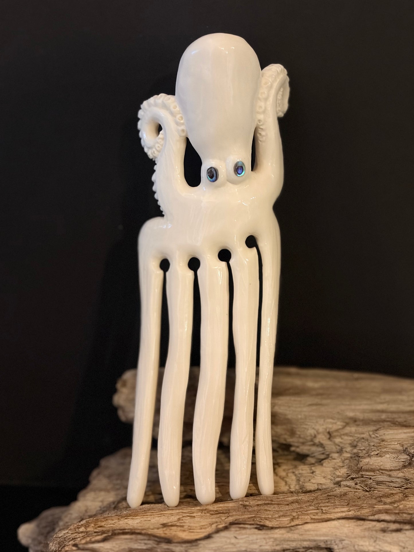 Carved Octopus Bone Heru (comb) by Alex Sands
