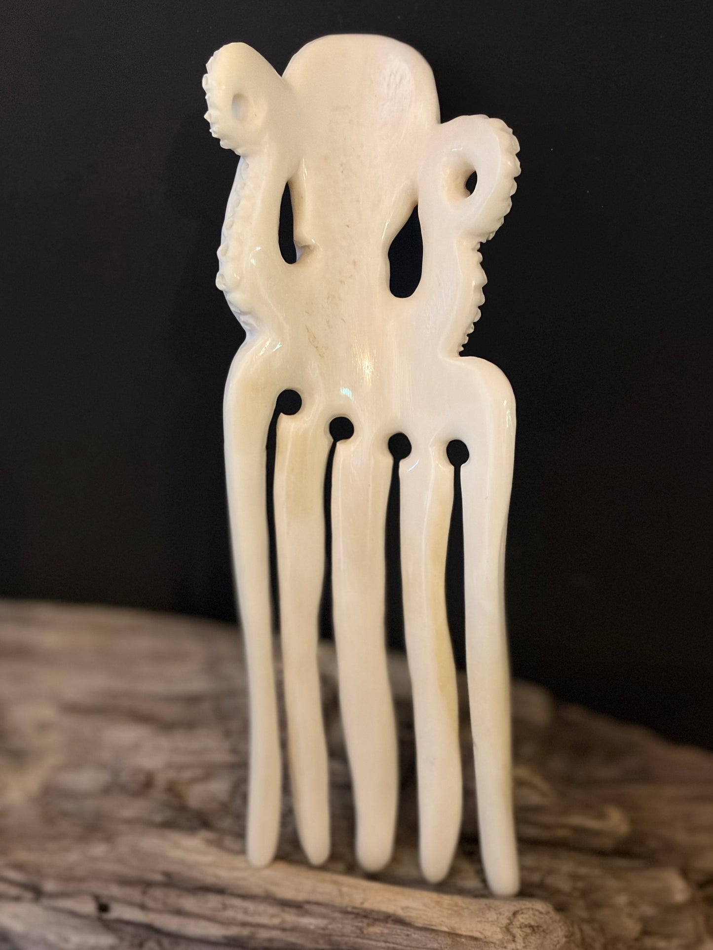 Carved Octopus Bone Heru (comb) by Alex Sands