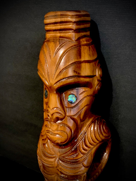 head detail of Maori teko teko statue carved in New Zealand and available from Silver Fern Gallery