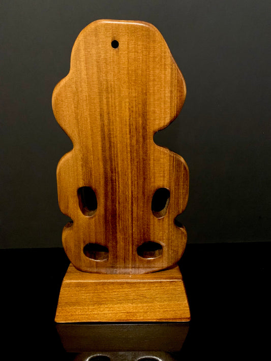 back view of Maori small koru on stand carved in New Zealand and available from Silver Fern Gallery