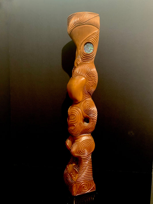 side view of Maori teko teko statue carved in New Zealand and available from Silver Fern Gallery