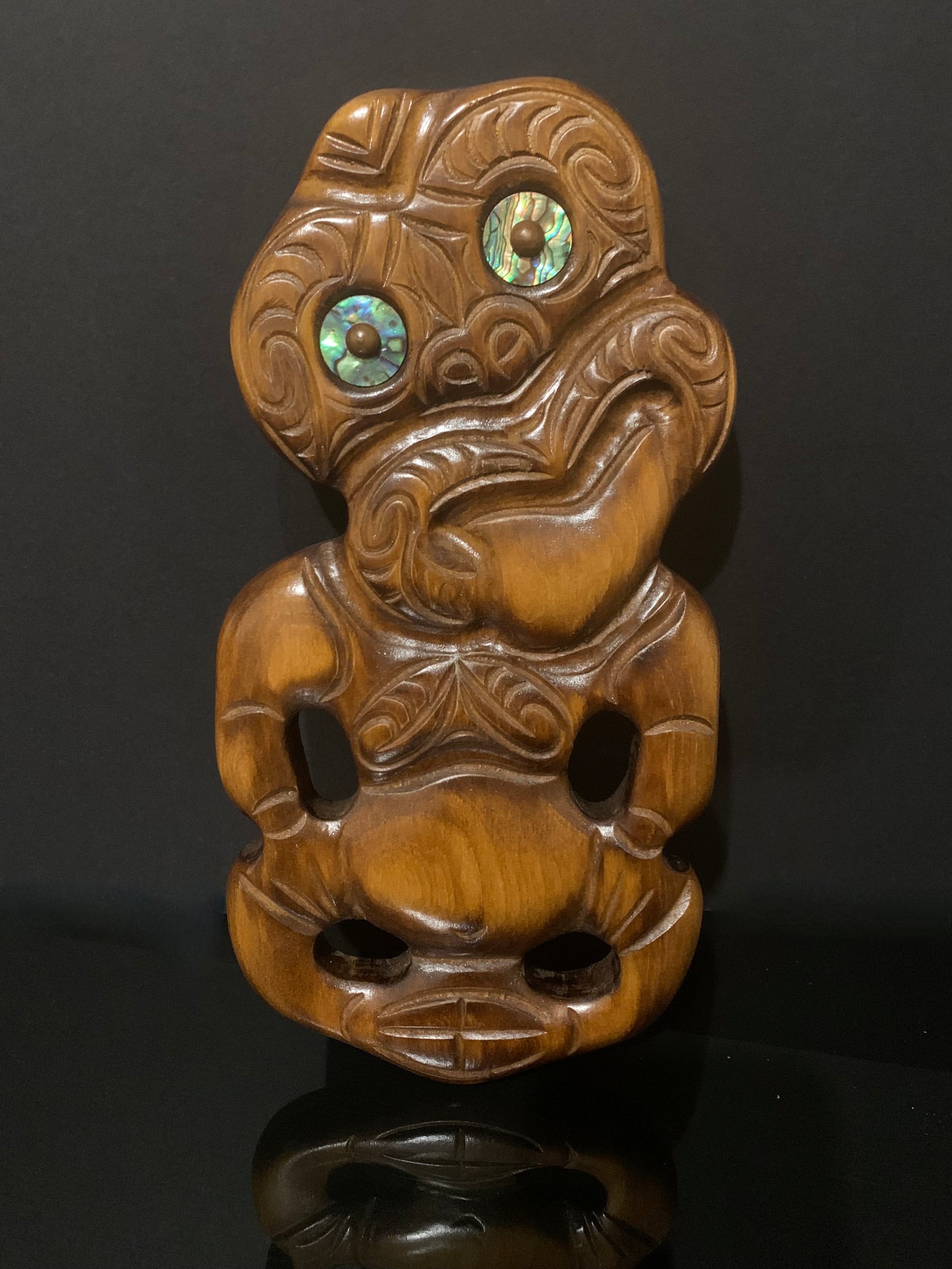 Maori wall tiki carved in New Zealand by Wood Masters available from Silver Fern Gallery